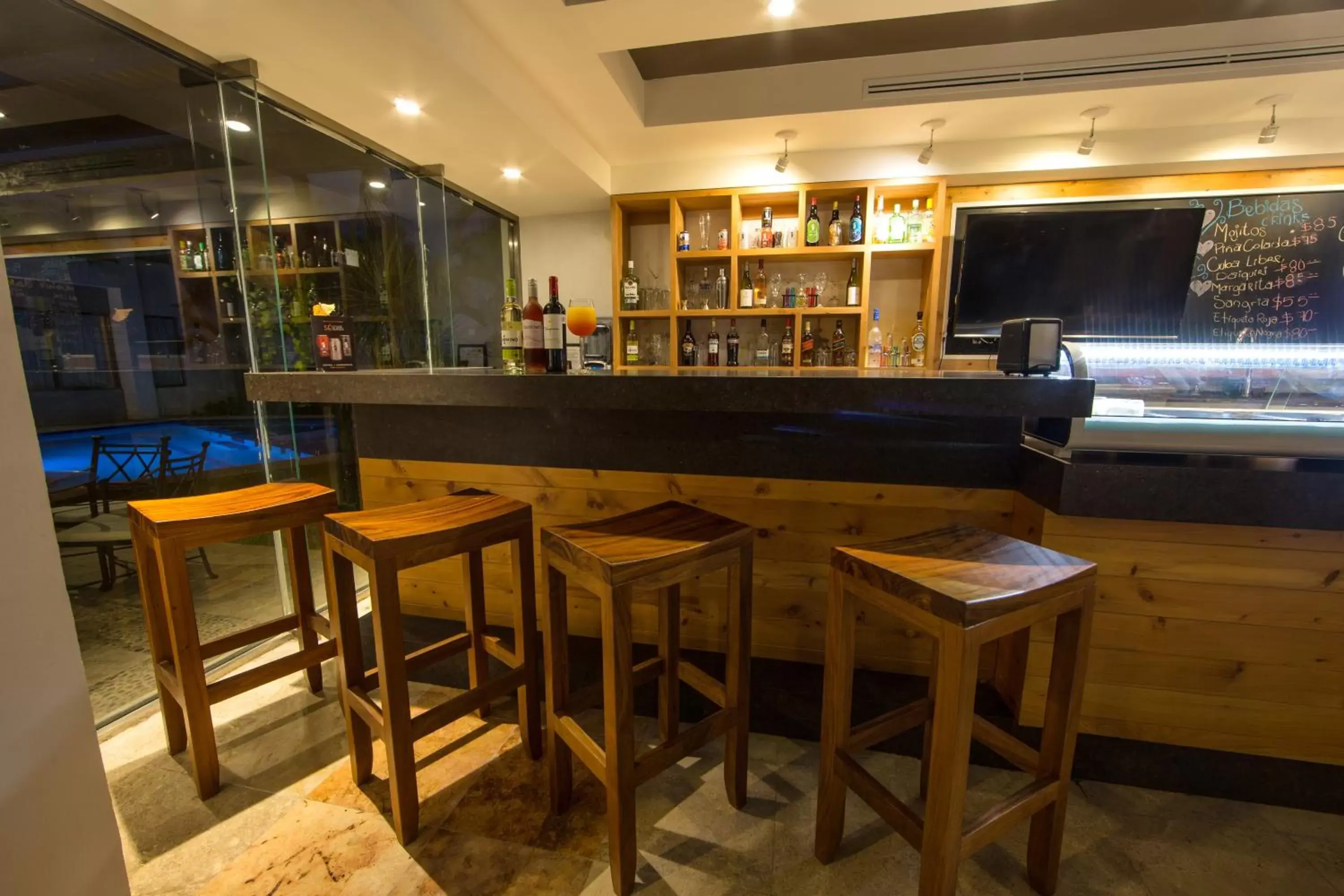 Restaurant/places to eat, Lounge/Bar in Ambiance Suites