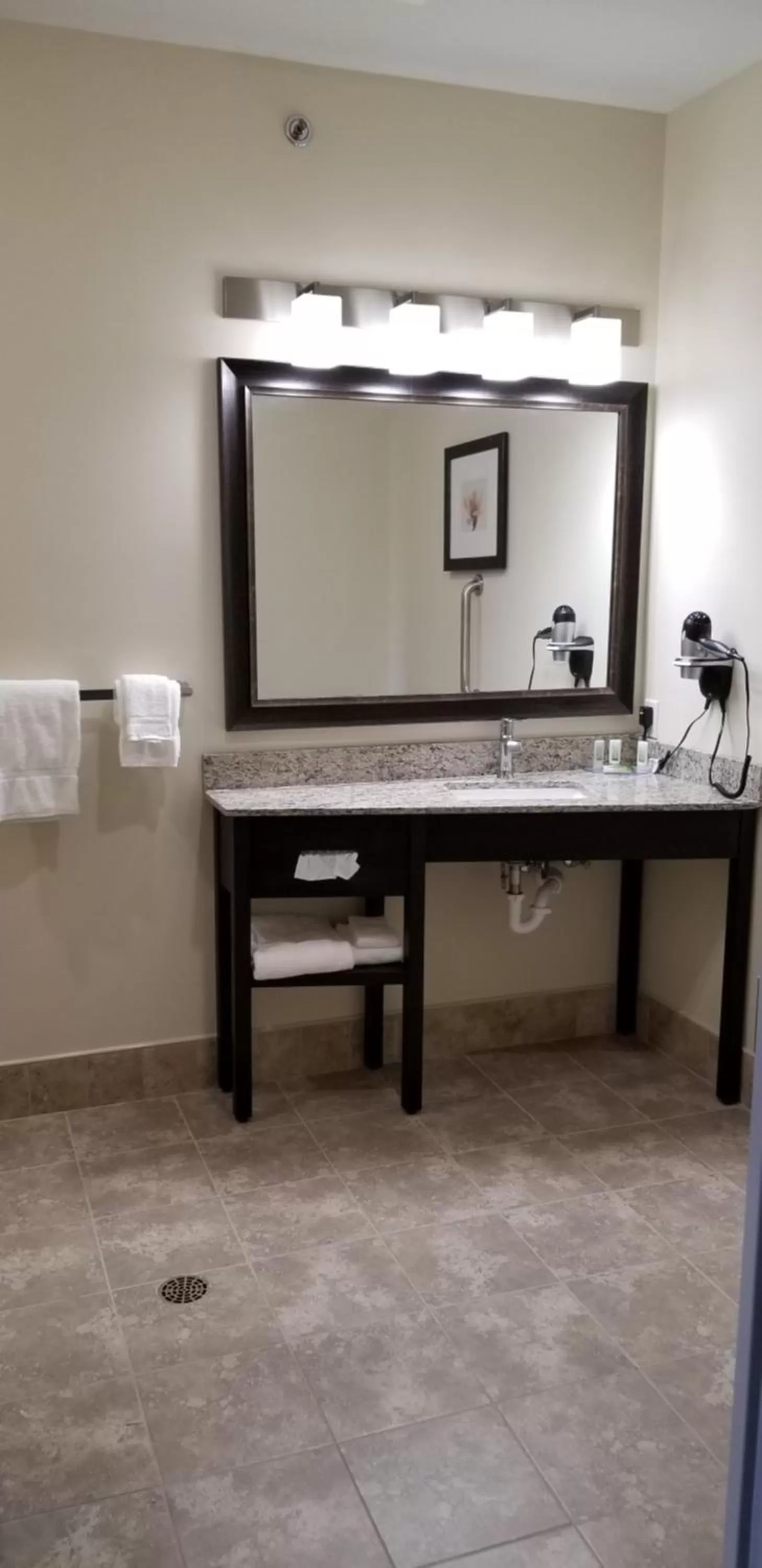 Bathroom in AmericInn by Wyndham Sioux Falls North