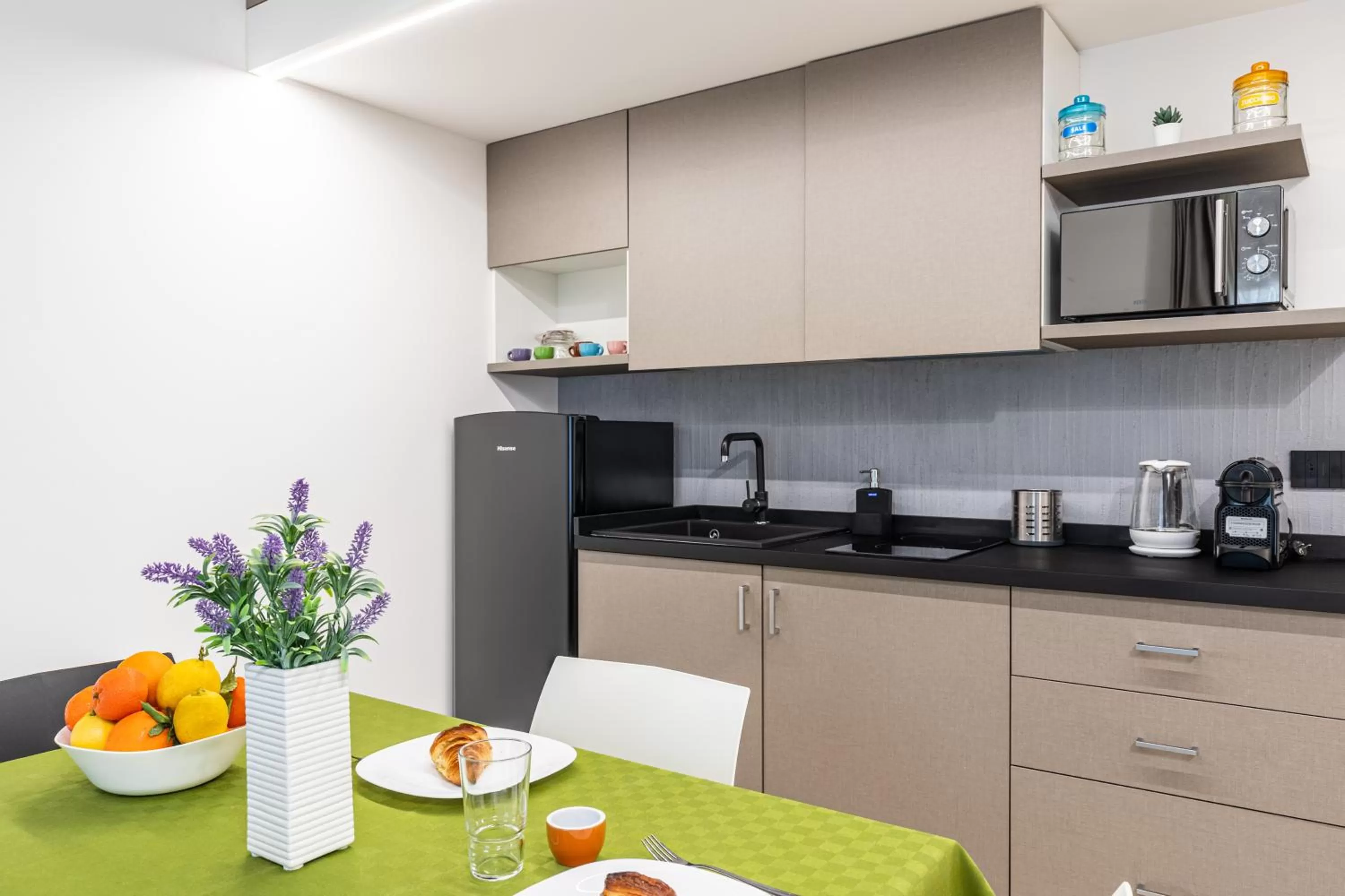 Kitchen or kitchenette in Solemar Sicilia - Multi Suite