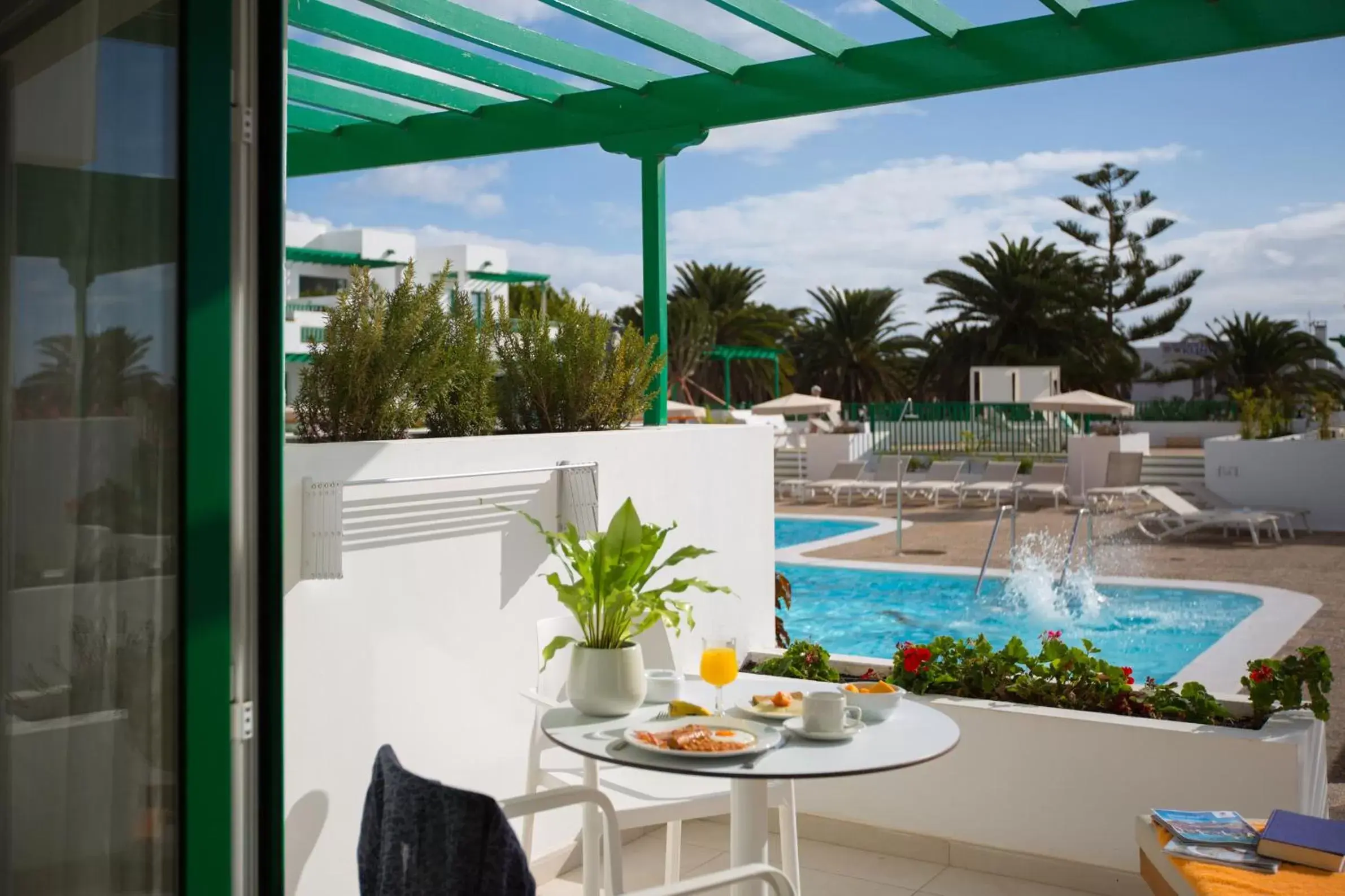 Balcony/Terrace, Pool View in Nazaret Apartments