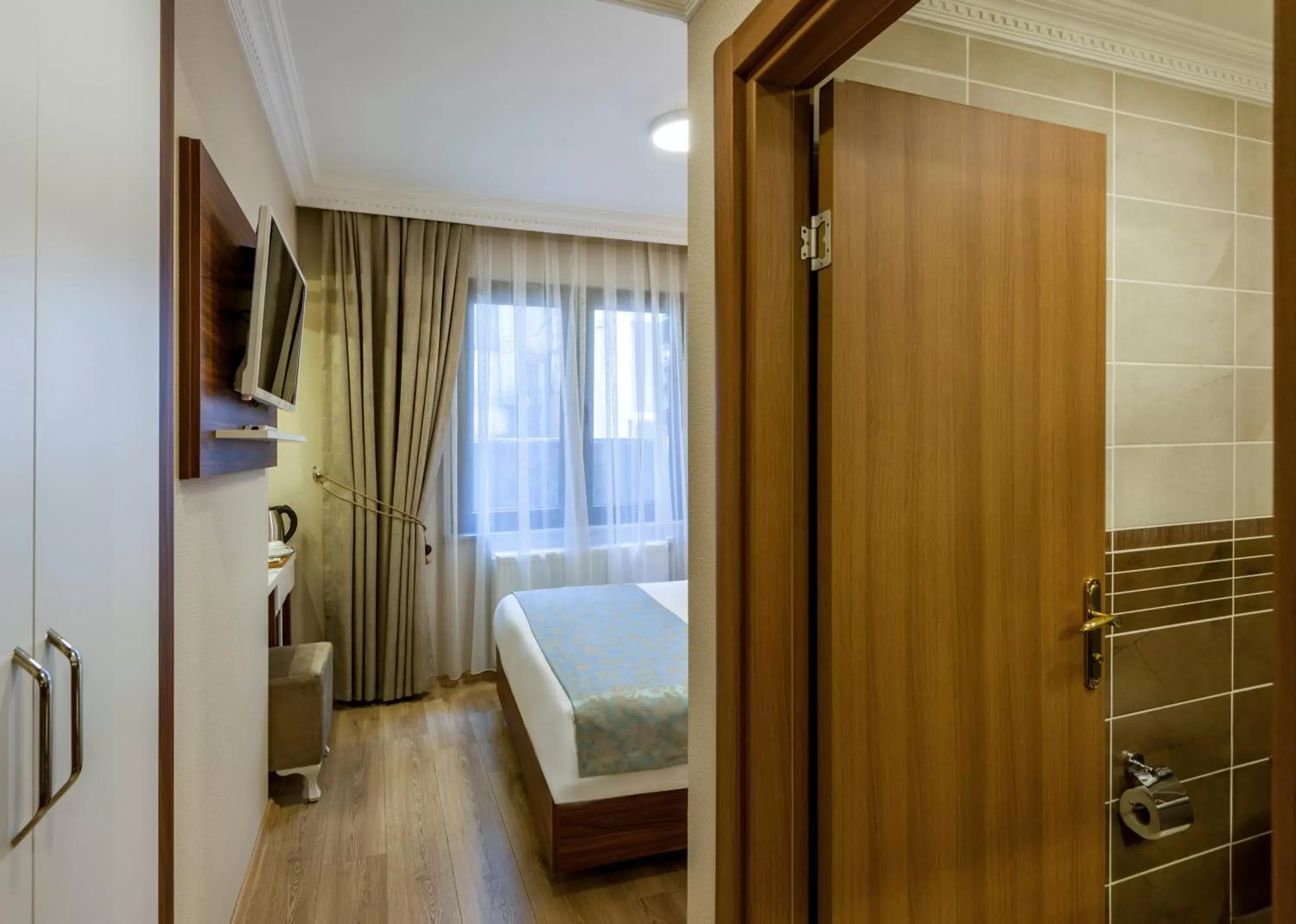 Bedroom, Bathroom in Kupeli Hotel