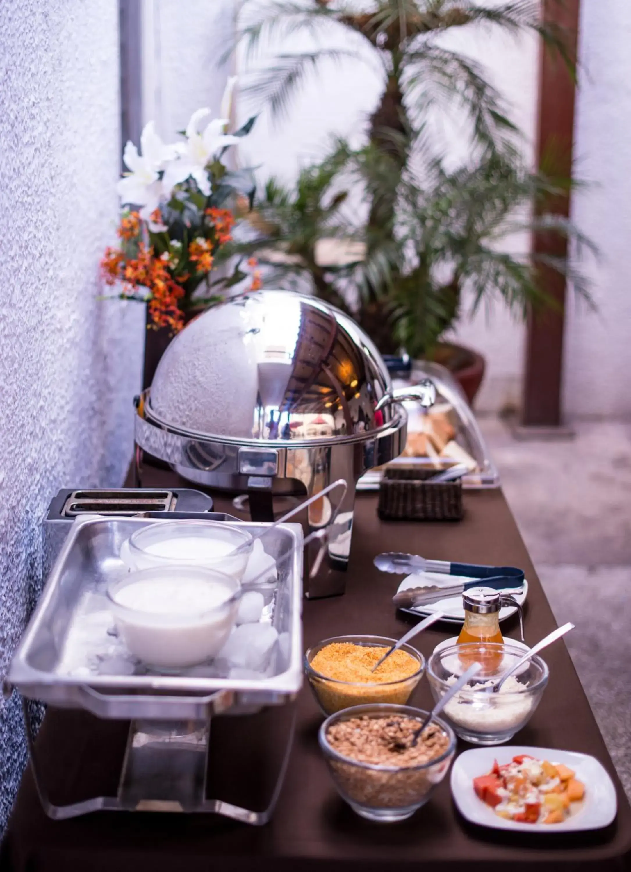 Dining area in Del Marques Hotel and Suites