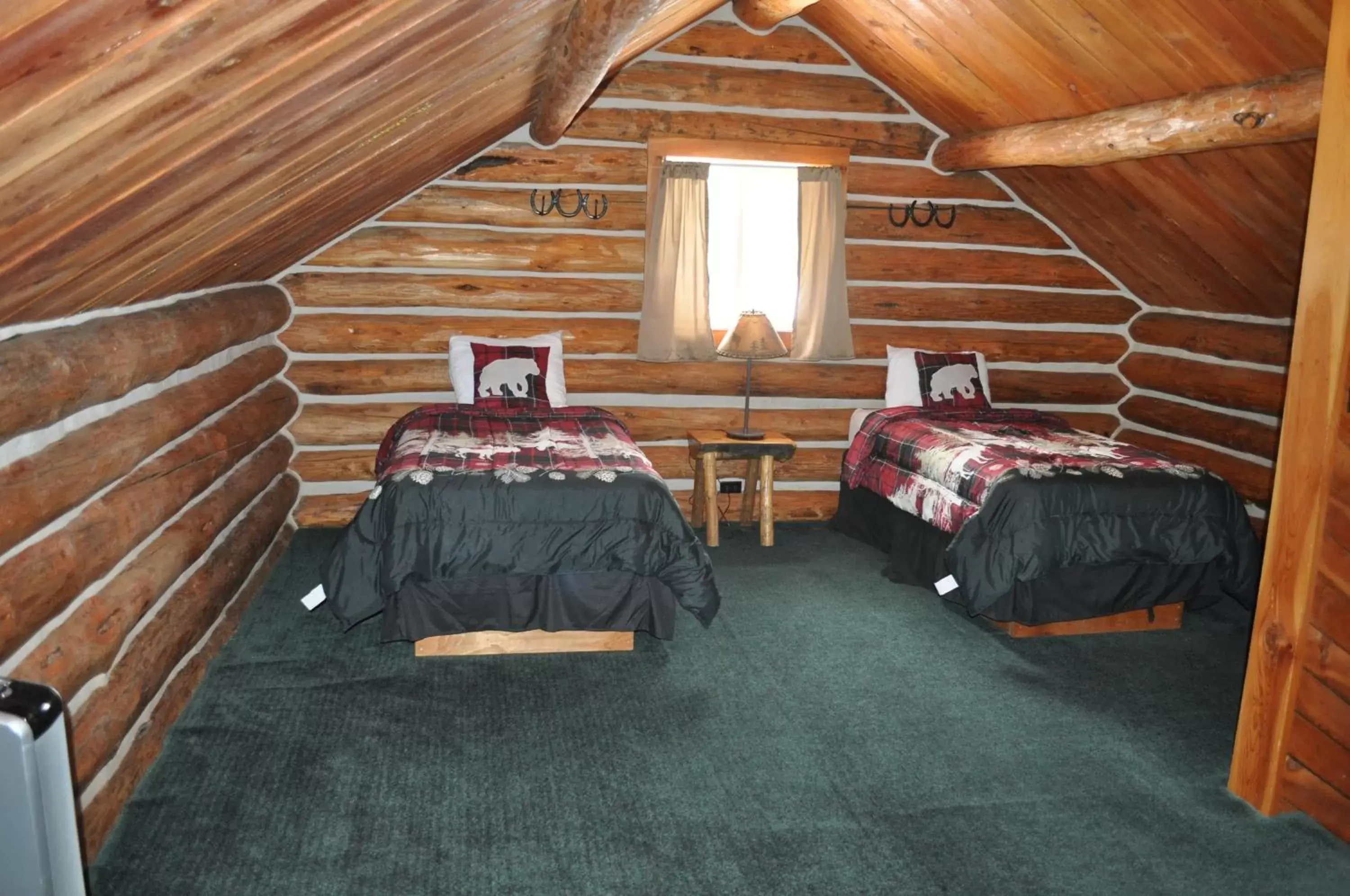 Bed in Crooked Creek Guest Ranch