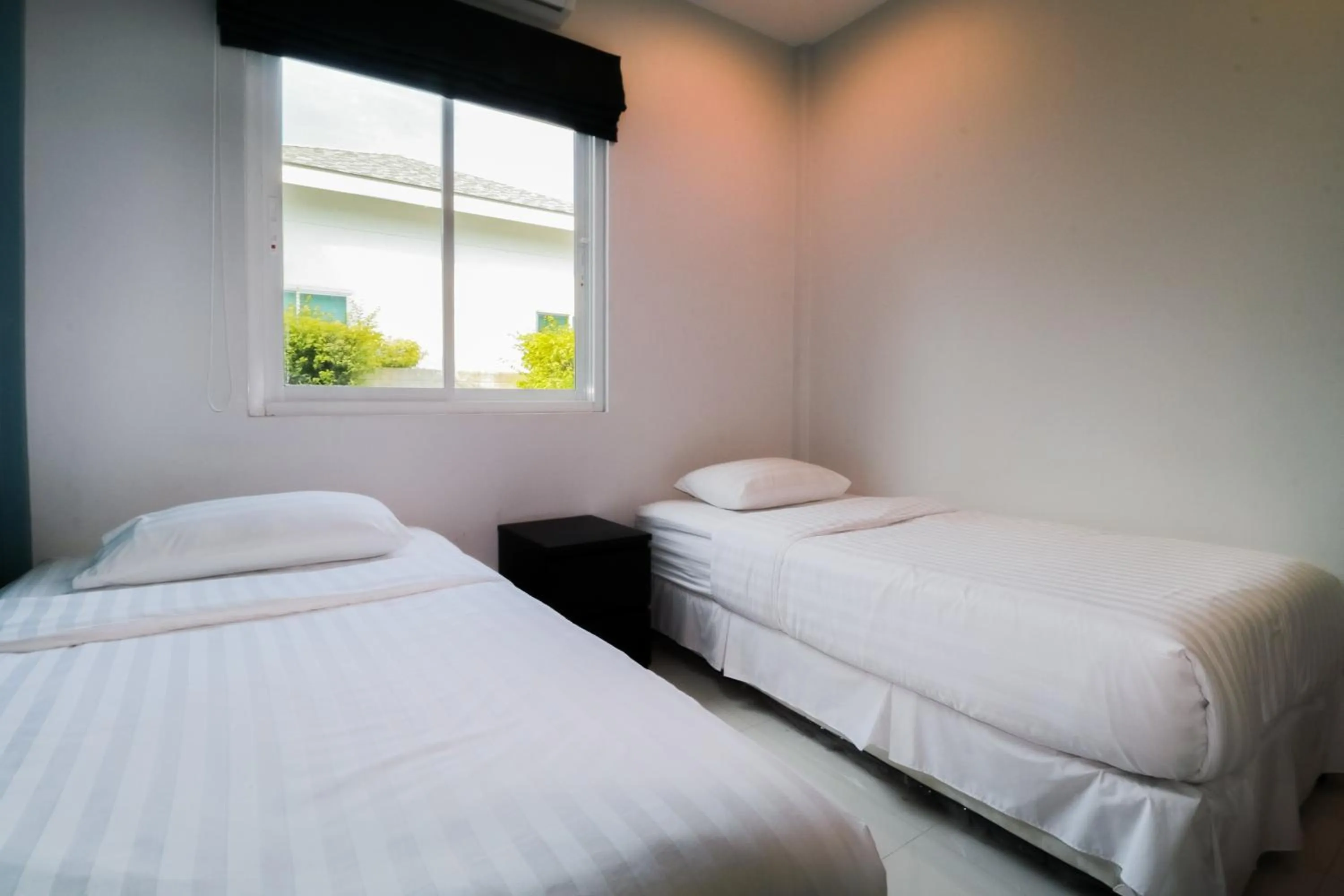 Bed in Chaum Haus Pool Villas