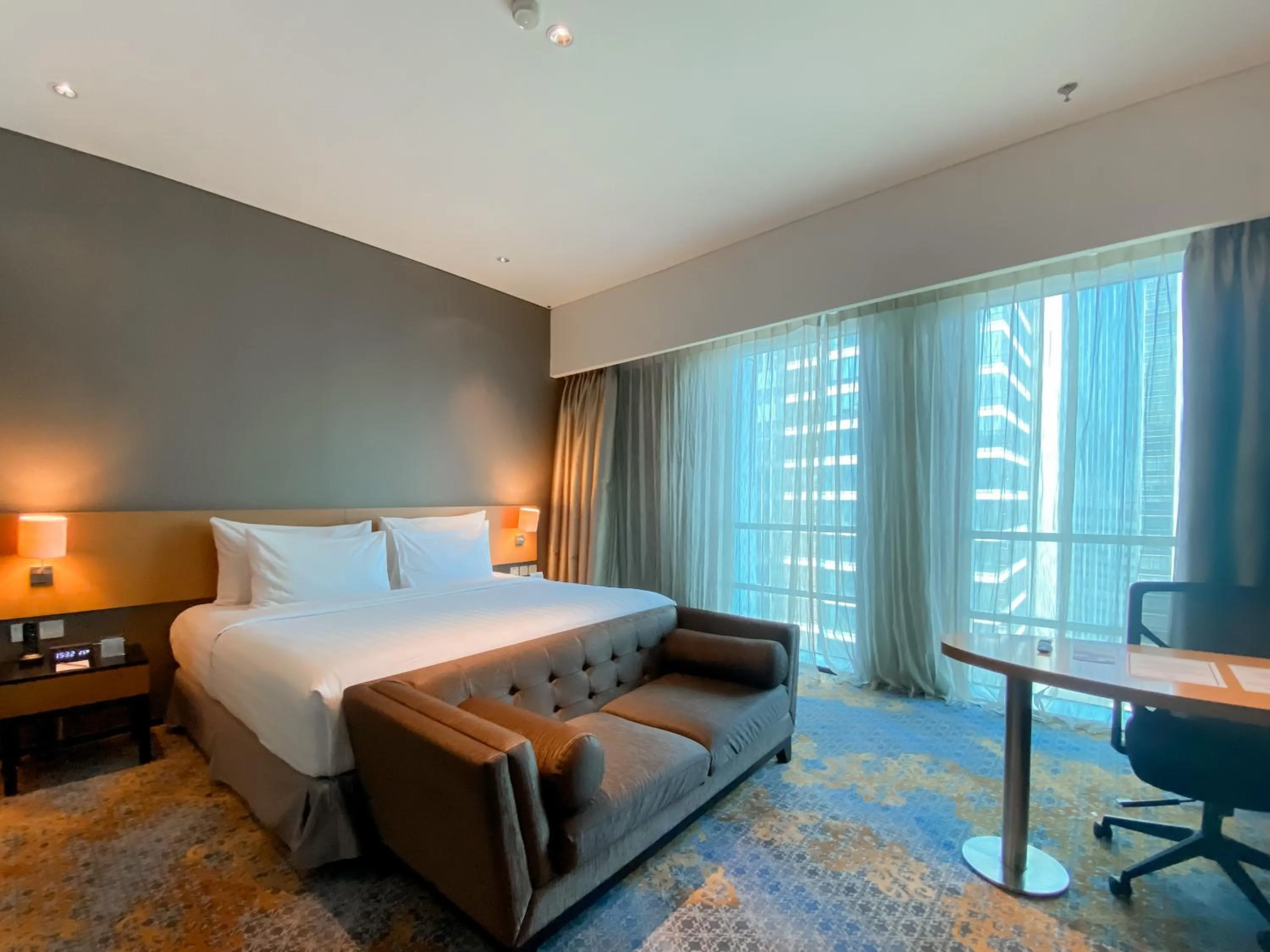 Bed in JS Luwansa Hotel & Convention Center