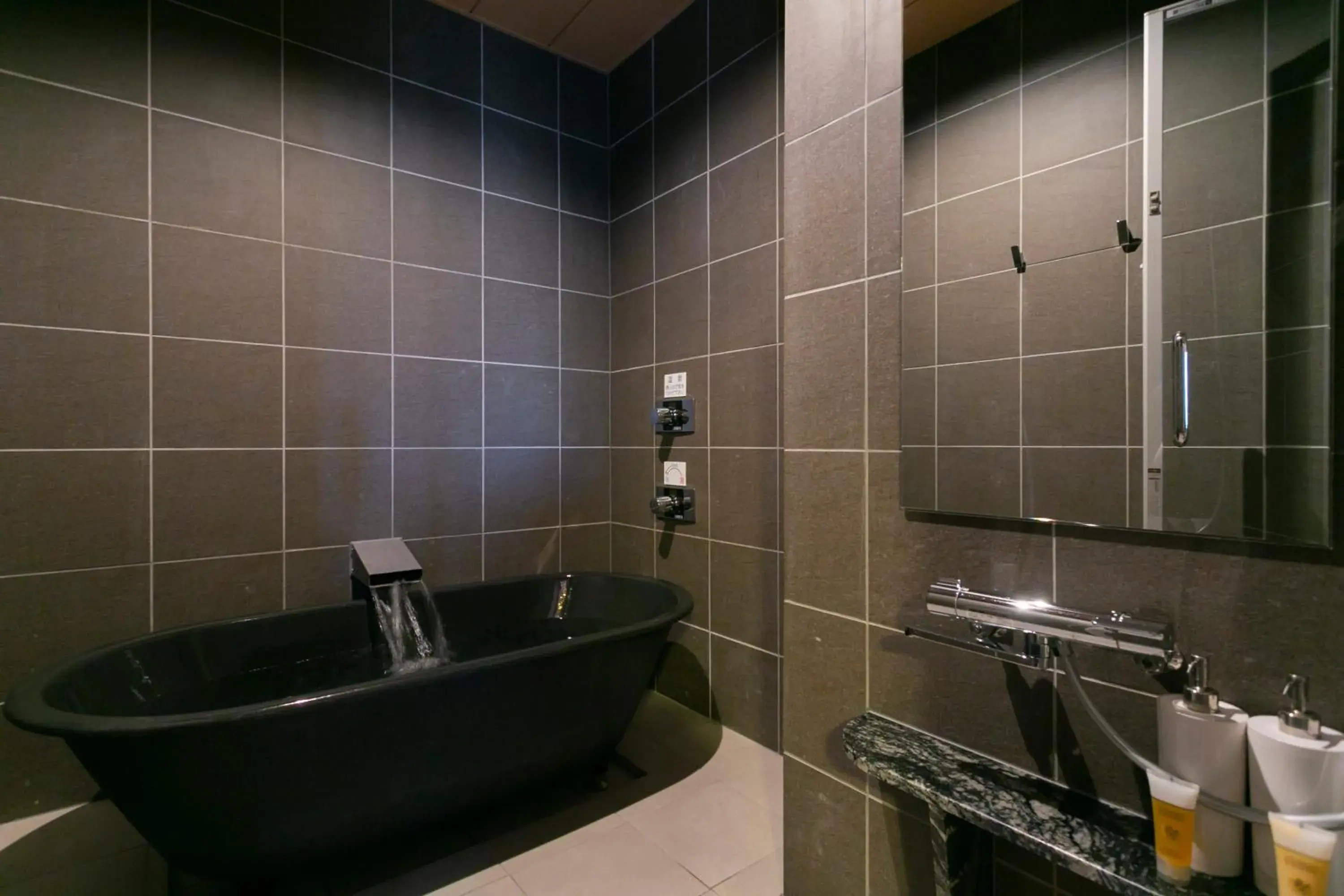 Bathroom in Ryokan Yoshidaya Bathroom in Ryokan Yoshidaya