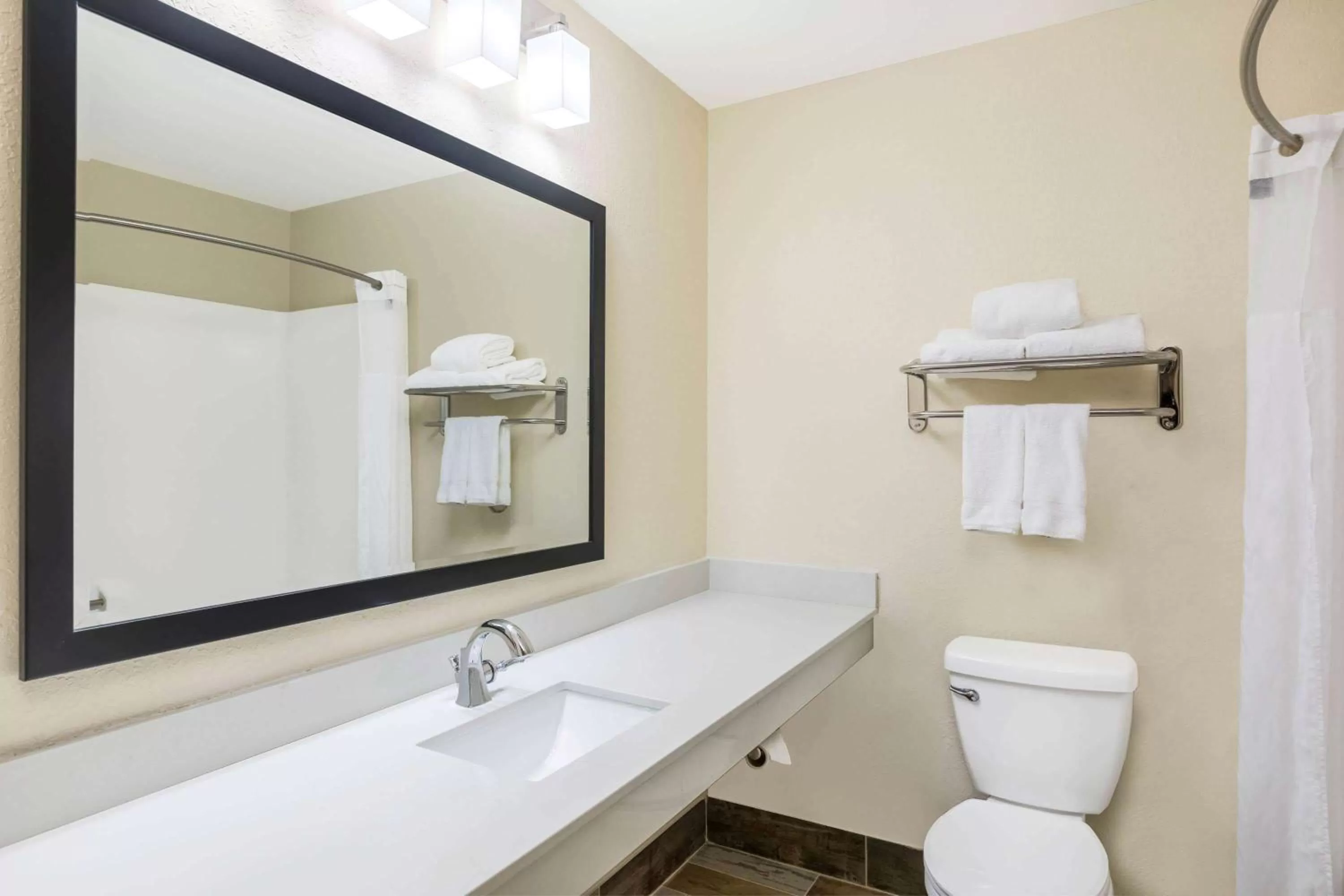 Bathroom in AmericInn by Wyndham Prairie du Chien