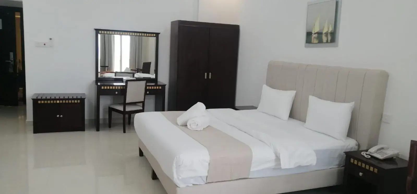 Bed in Salalah Beach Resort Hotel