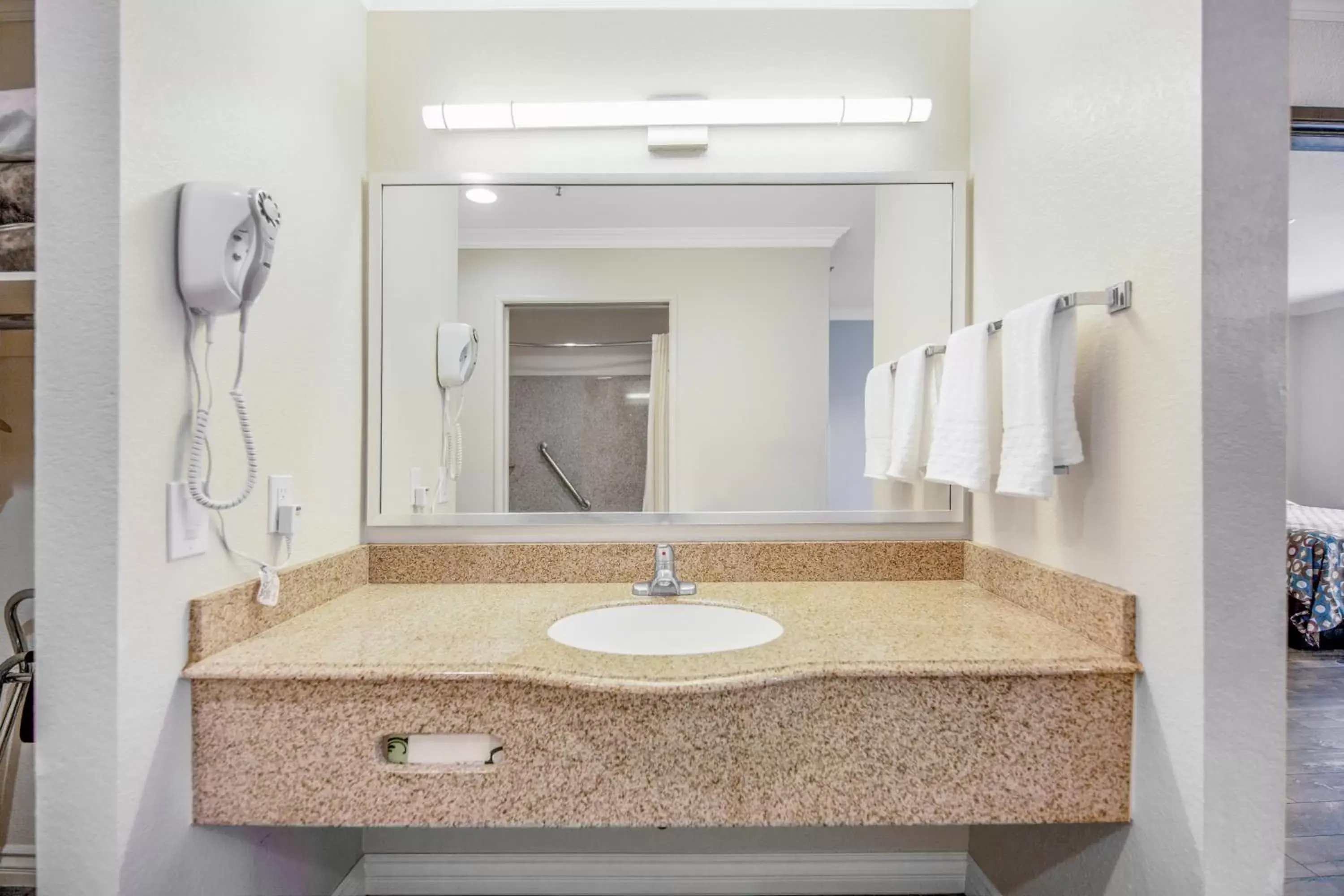 Bathroom in SureStay Hotel by Best Western Fontana