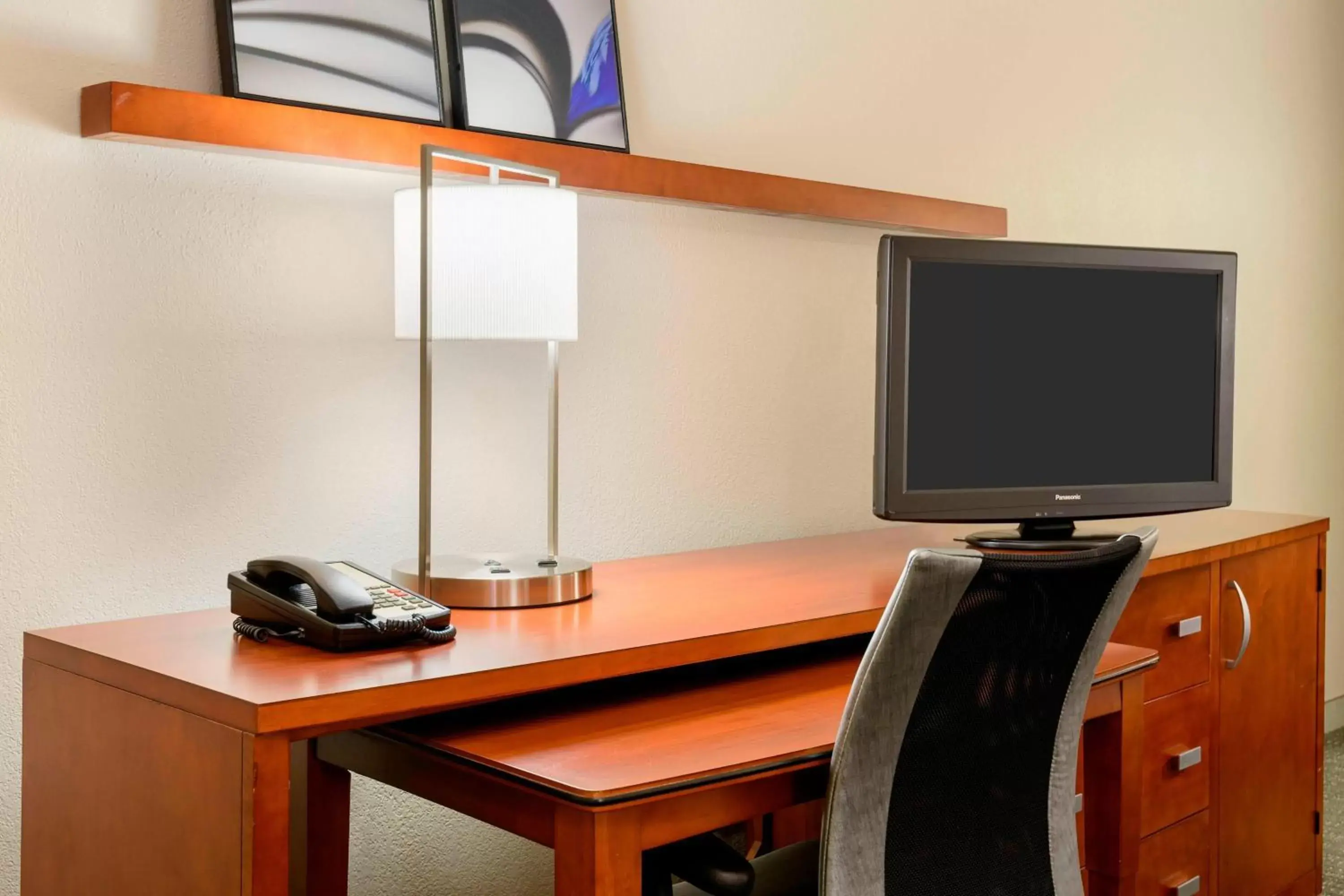 Photo of the whole room, TV/Entertainment Center in Courtyard by Marriott Gainesville