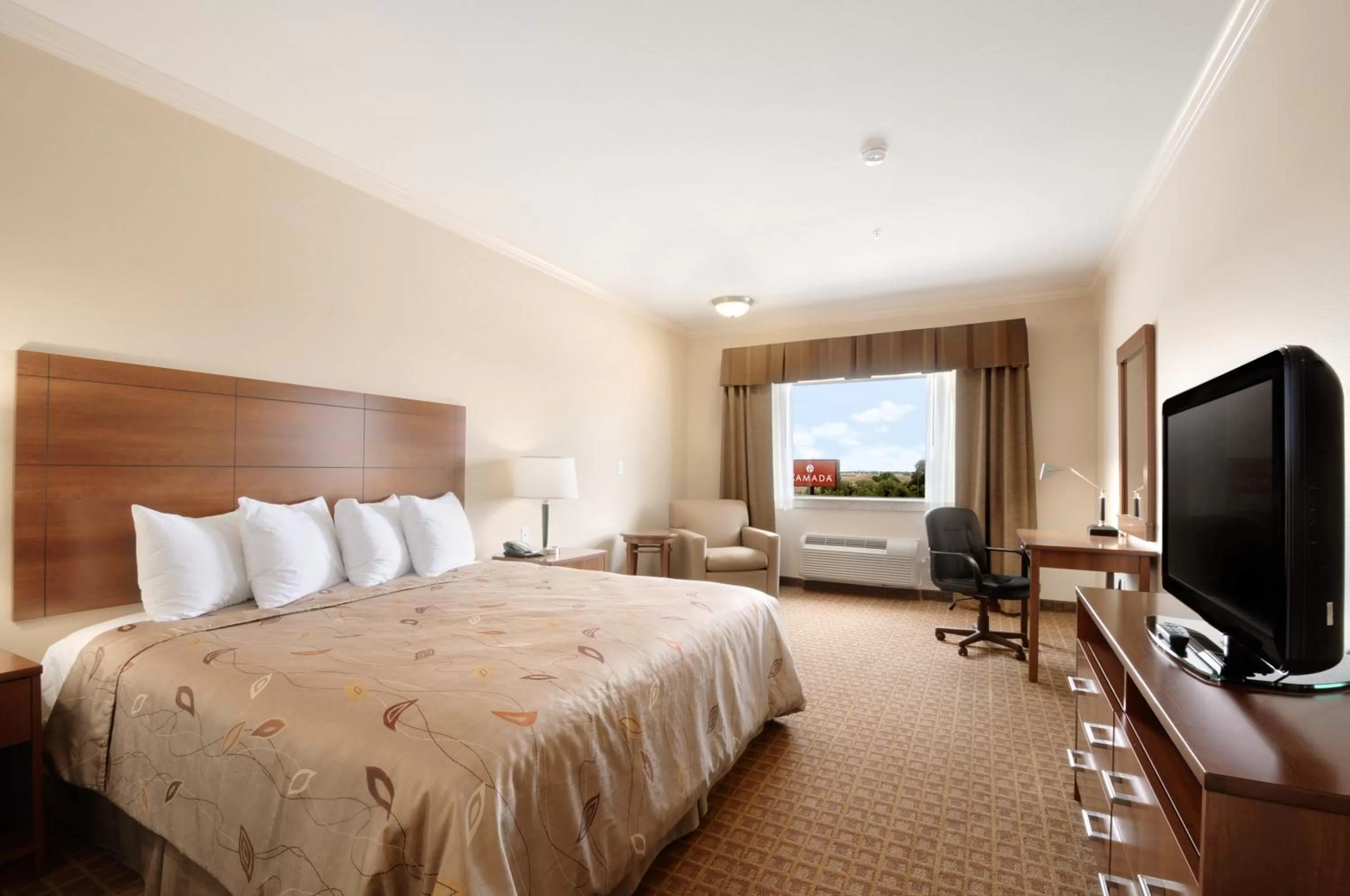 Photo of the whole room, Bed in Ramada by Wyndham College Station