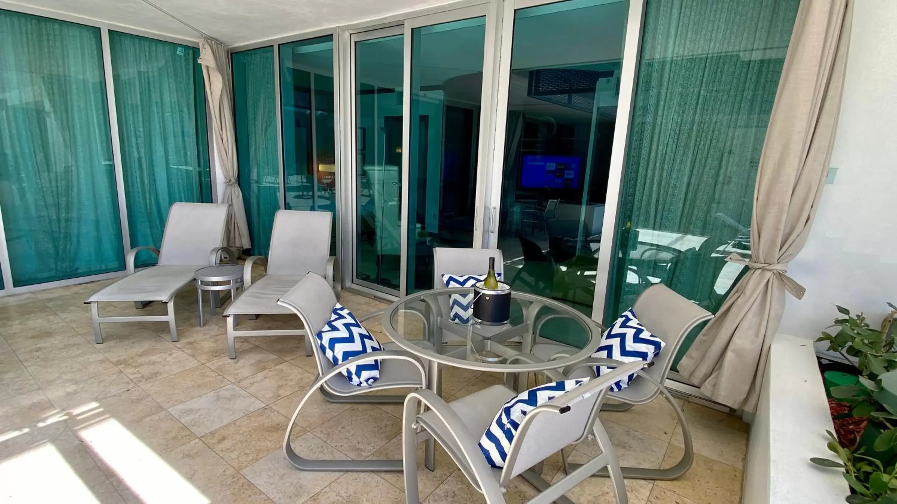 Patio in Boutique Suites 3 min walk to beach