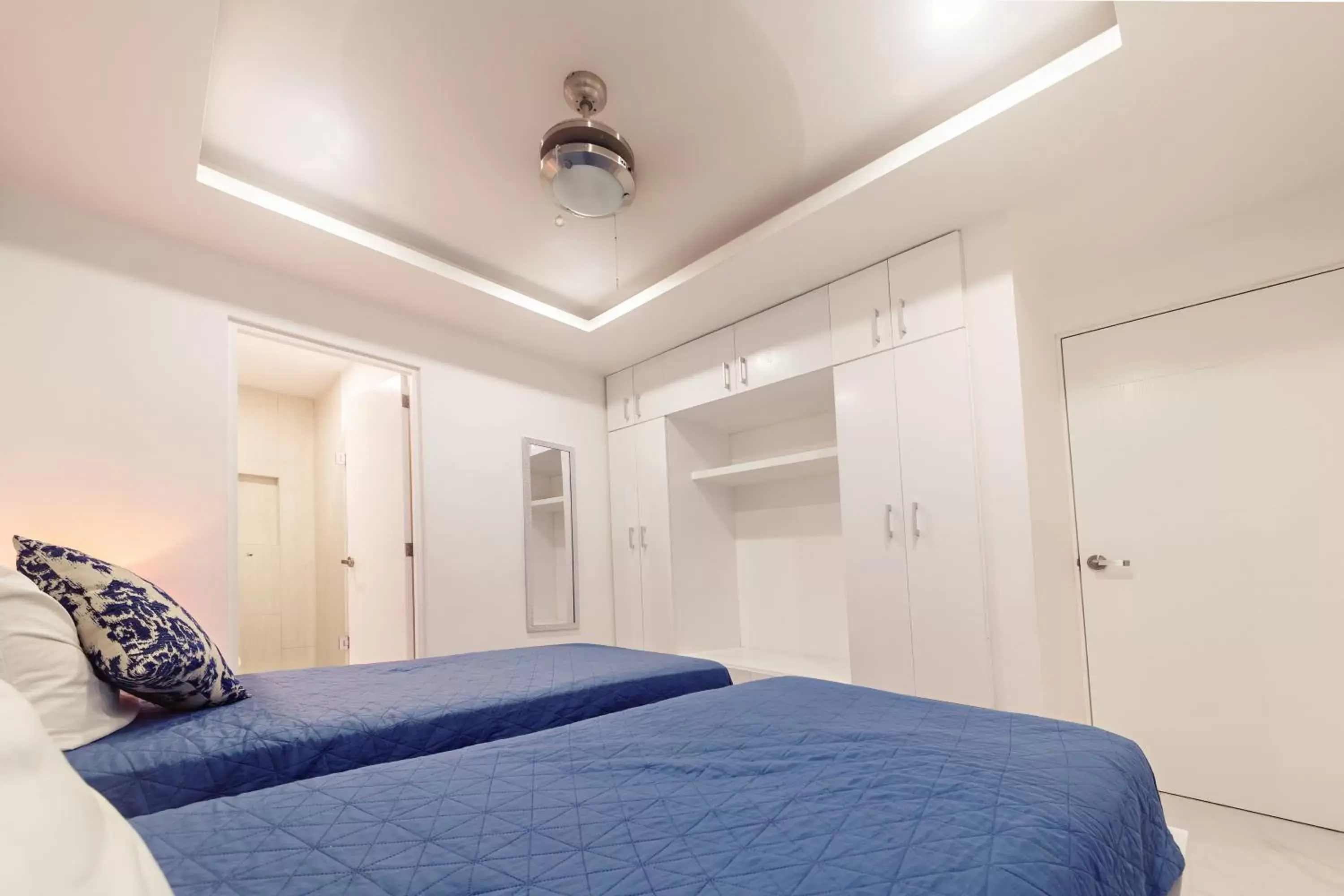 Bed in Mararena Condos by Nah Hotels