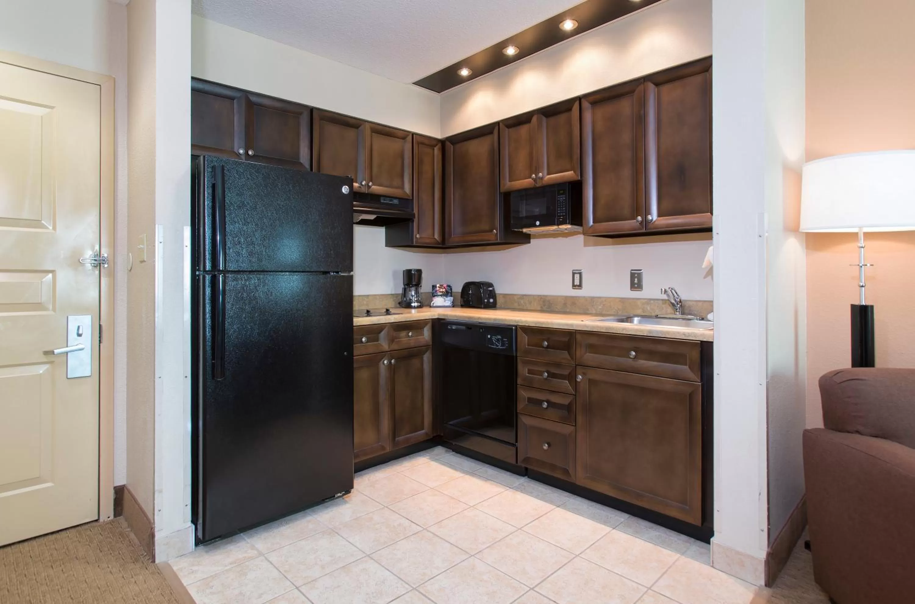 Kitchen or kitchenette in Hawthorn Extended Stay by Wyndham Orlando