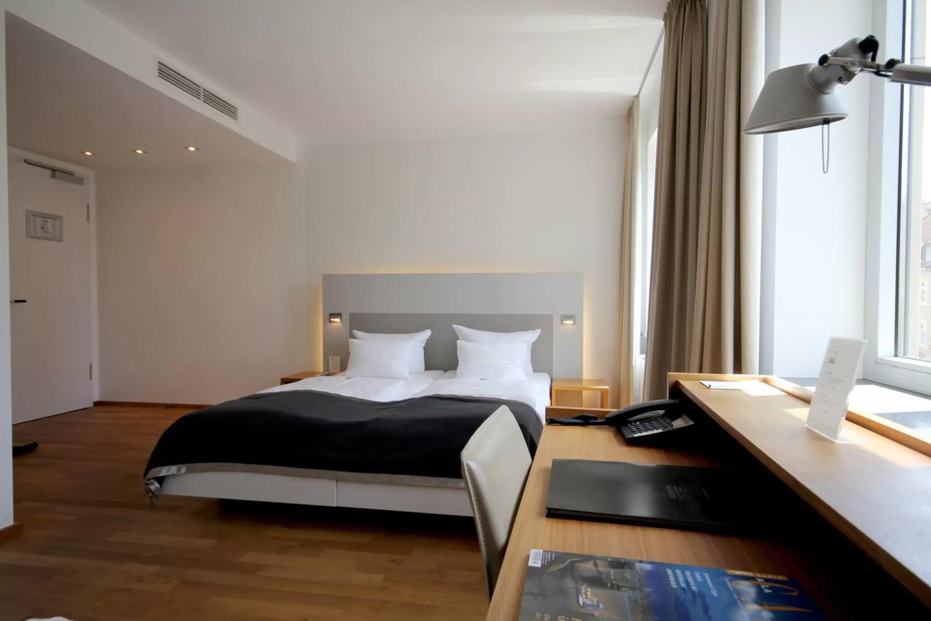 Photo of the whole room, Bed in Qube Hotel Bergheim