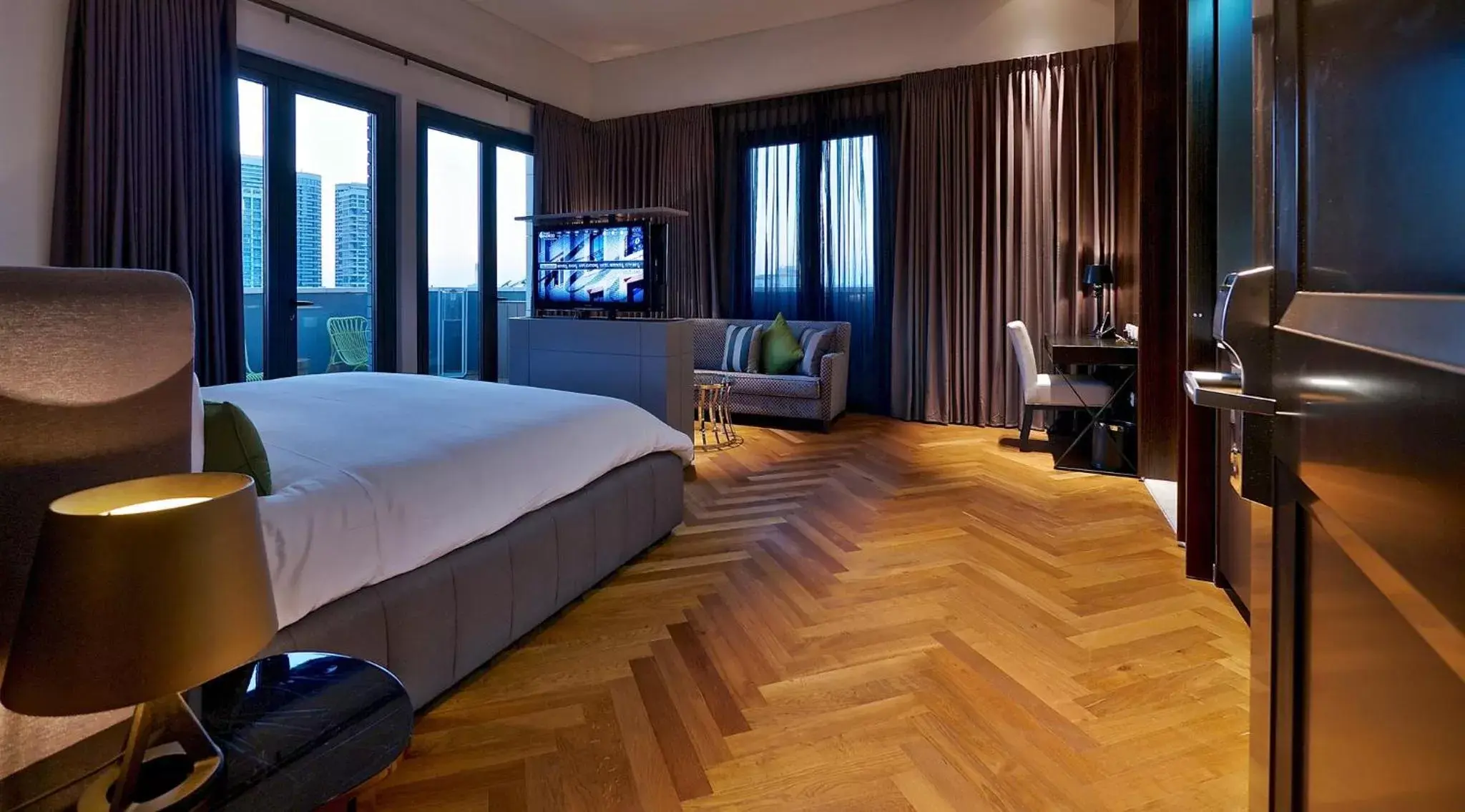 Photo of the whole room, TV/Entertainment Center in Hotel Indigo Tel Aviv - Diamond District, an IHG Hotel