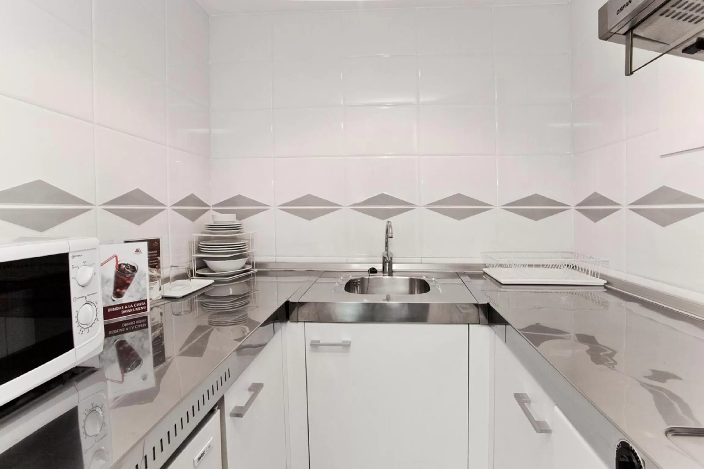 Kitchen or kitchenette in Aparthotel Atenea Barcelona