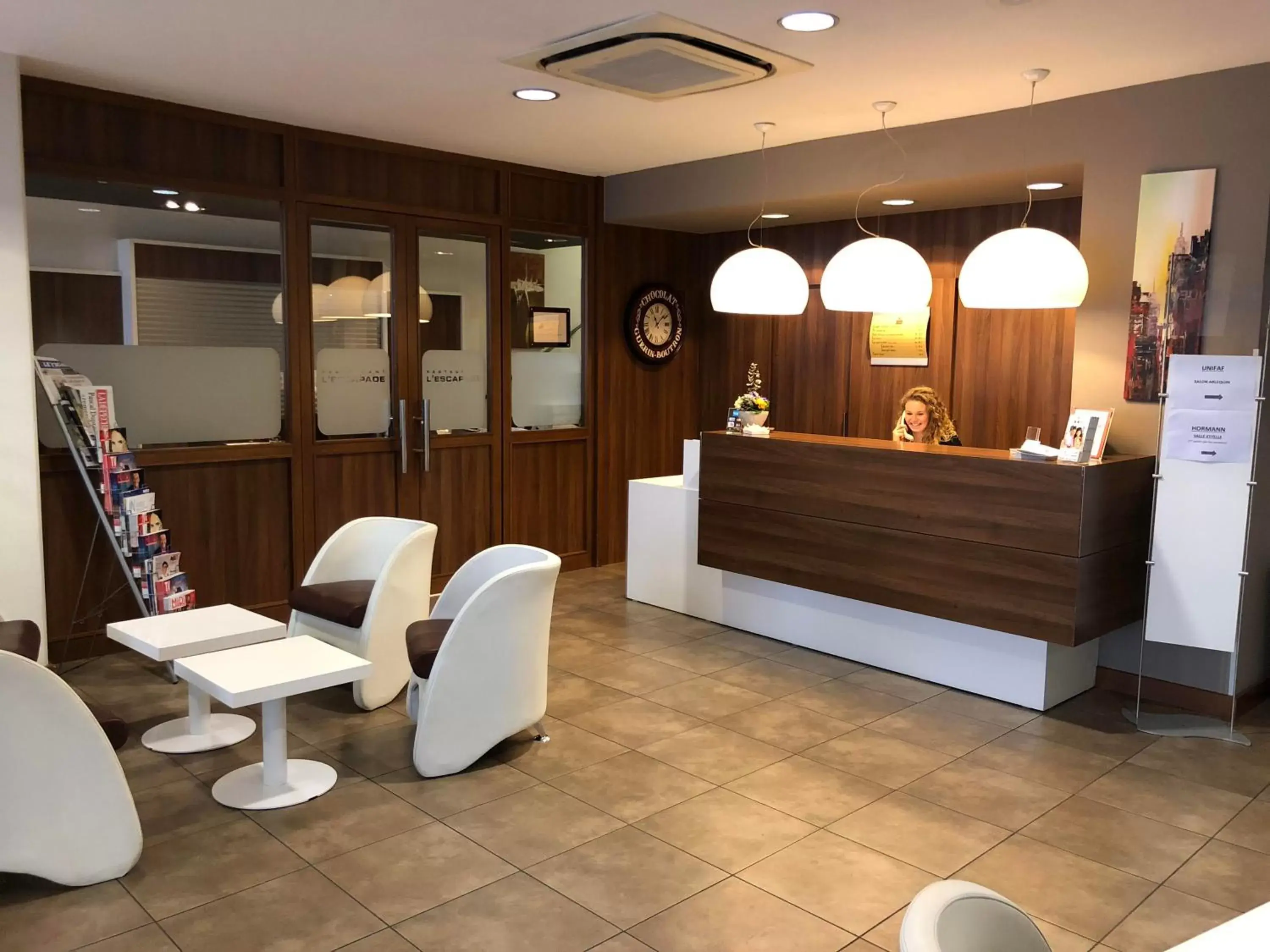 Lobby or reception in Cit'Hotel Stim'Otel Lobby or reception in Cit'Hotel Stim'Otel