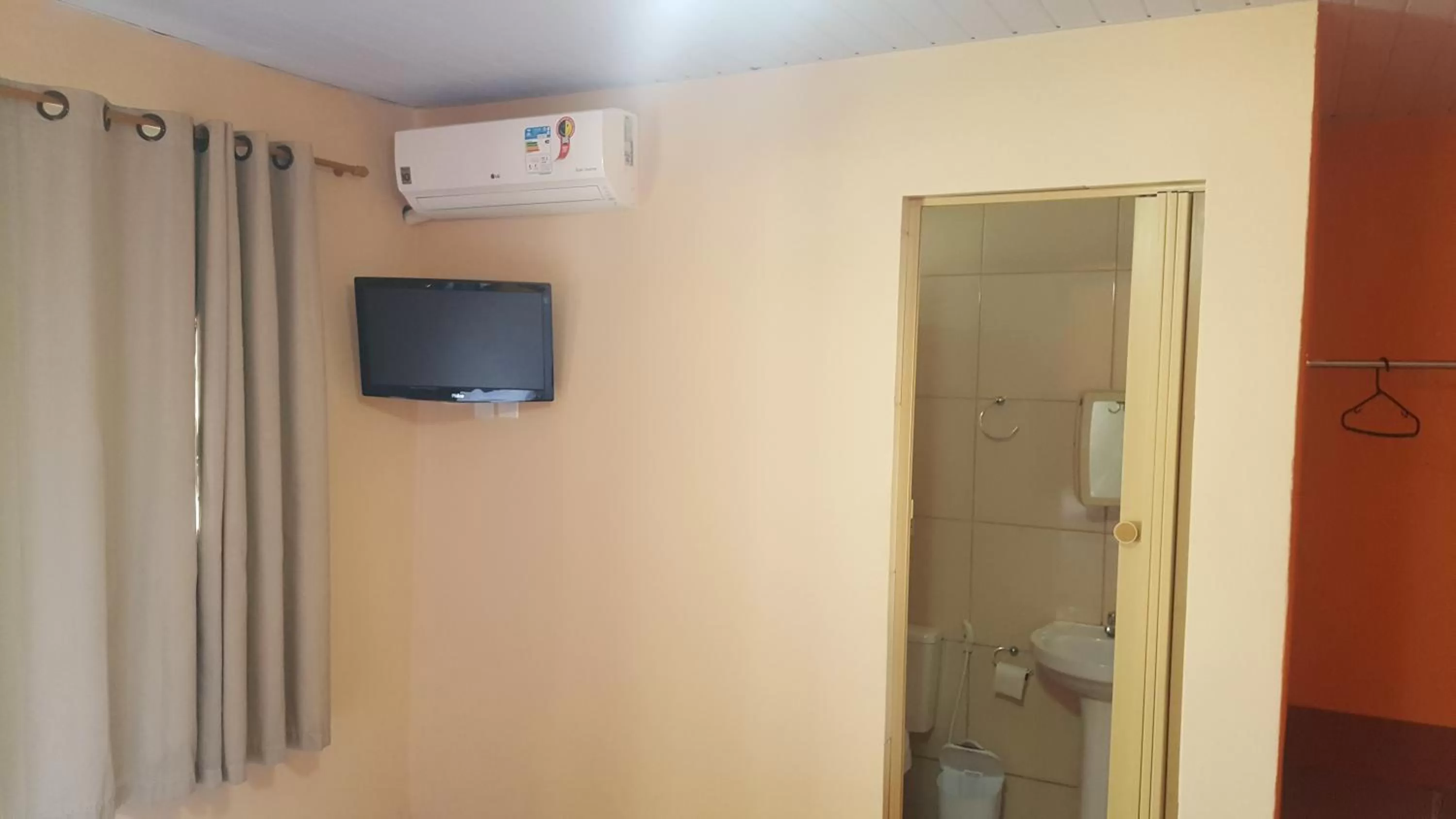 TV/Entertainment Center in Pousada Solar Tropical