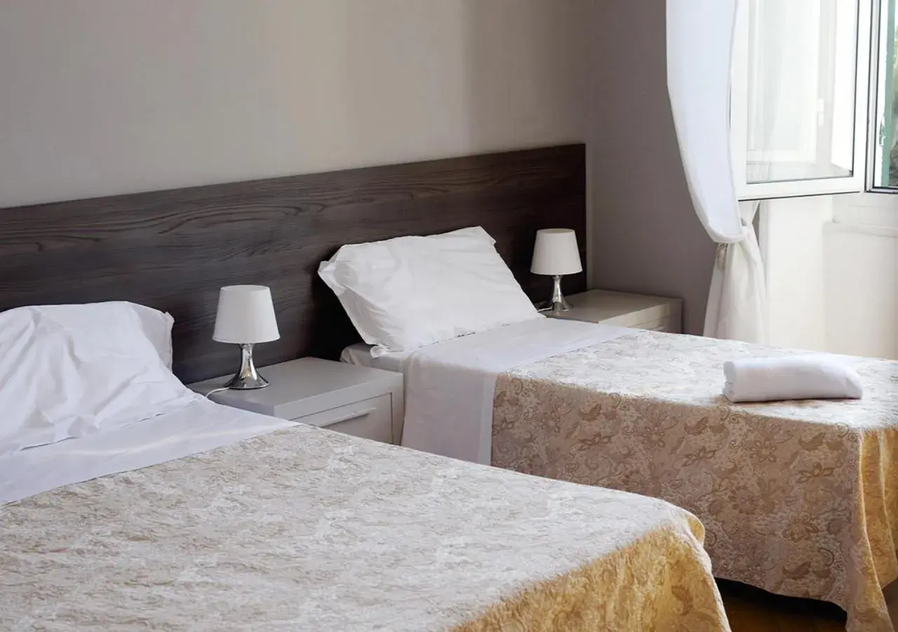 Bed in Hotel Mediterranee