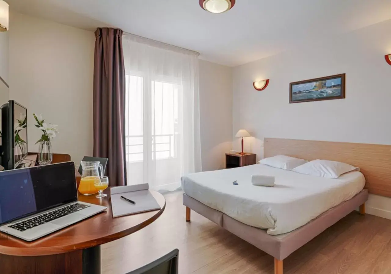 Bed in Zenitude Hôtel-Résidences Béziers Centre Bed in Zenitude Hôtel-Résidences Béziers Centre