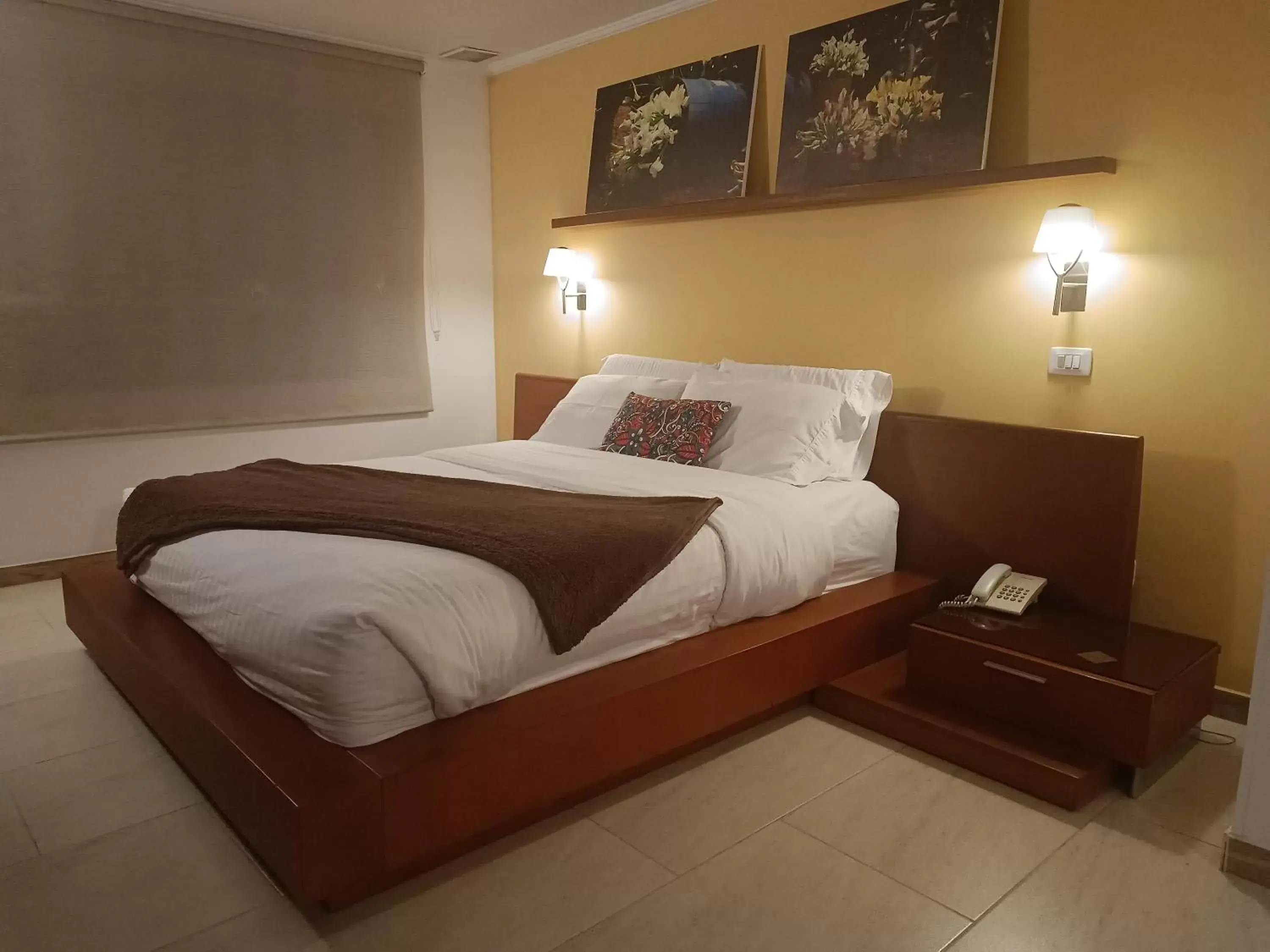 Bed in Hotel Boutique Confort Suites