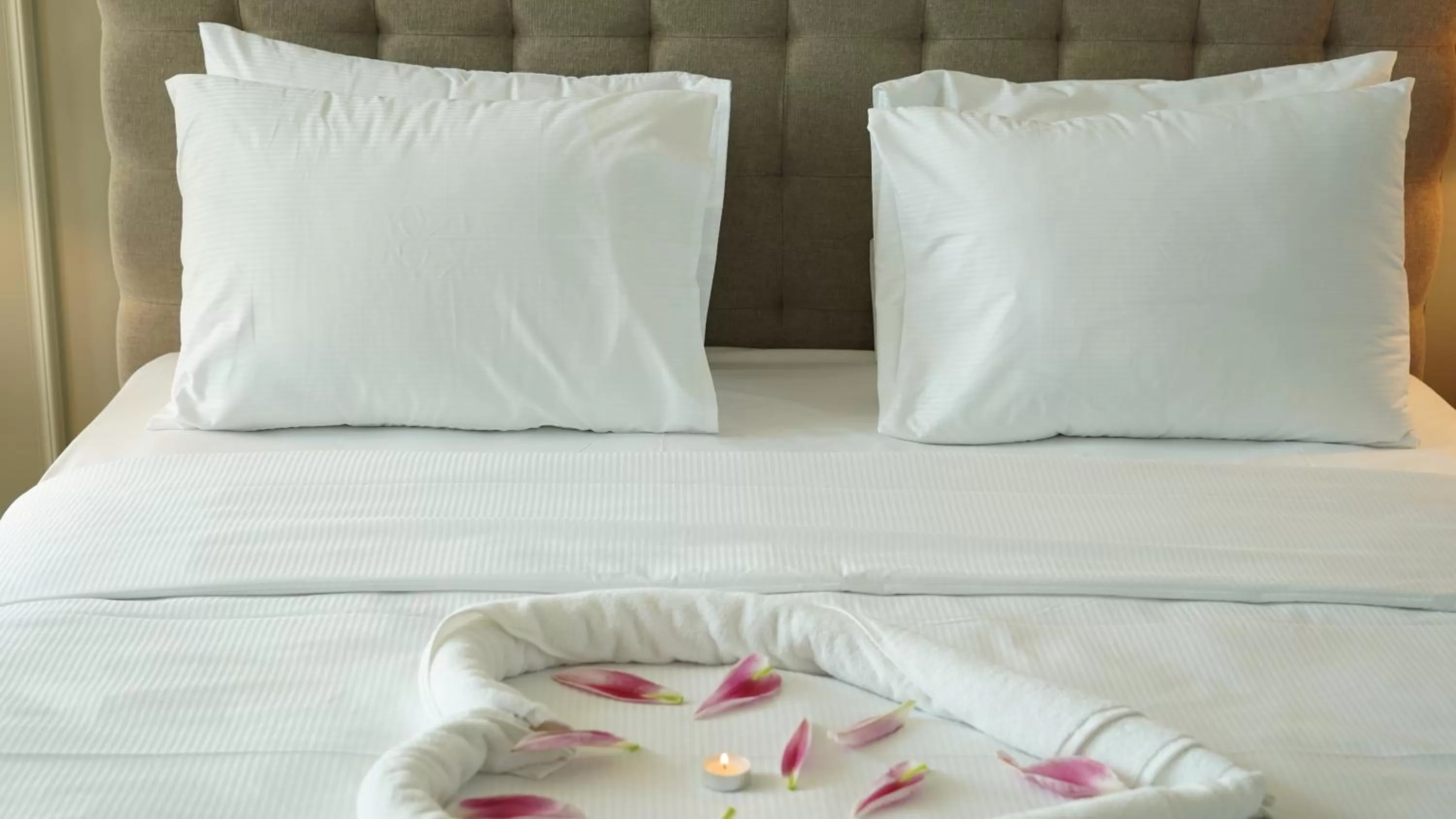 Bed in Horizon Manor Hotel