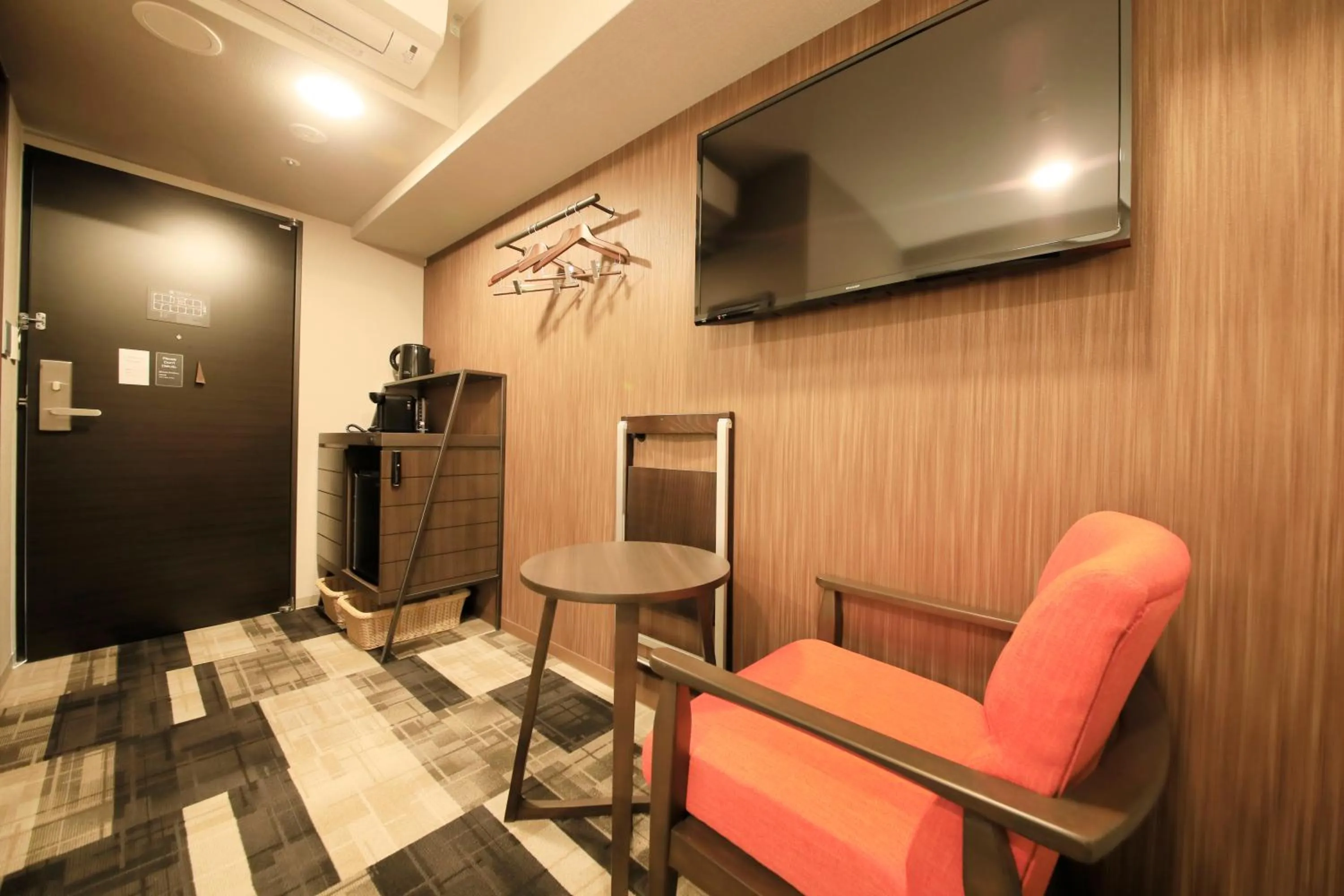 Photo of the whole room, TV/Entertainment Center in S-peria Inn Osaka Hommachi