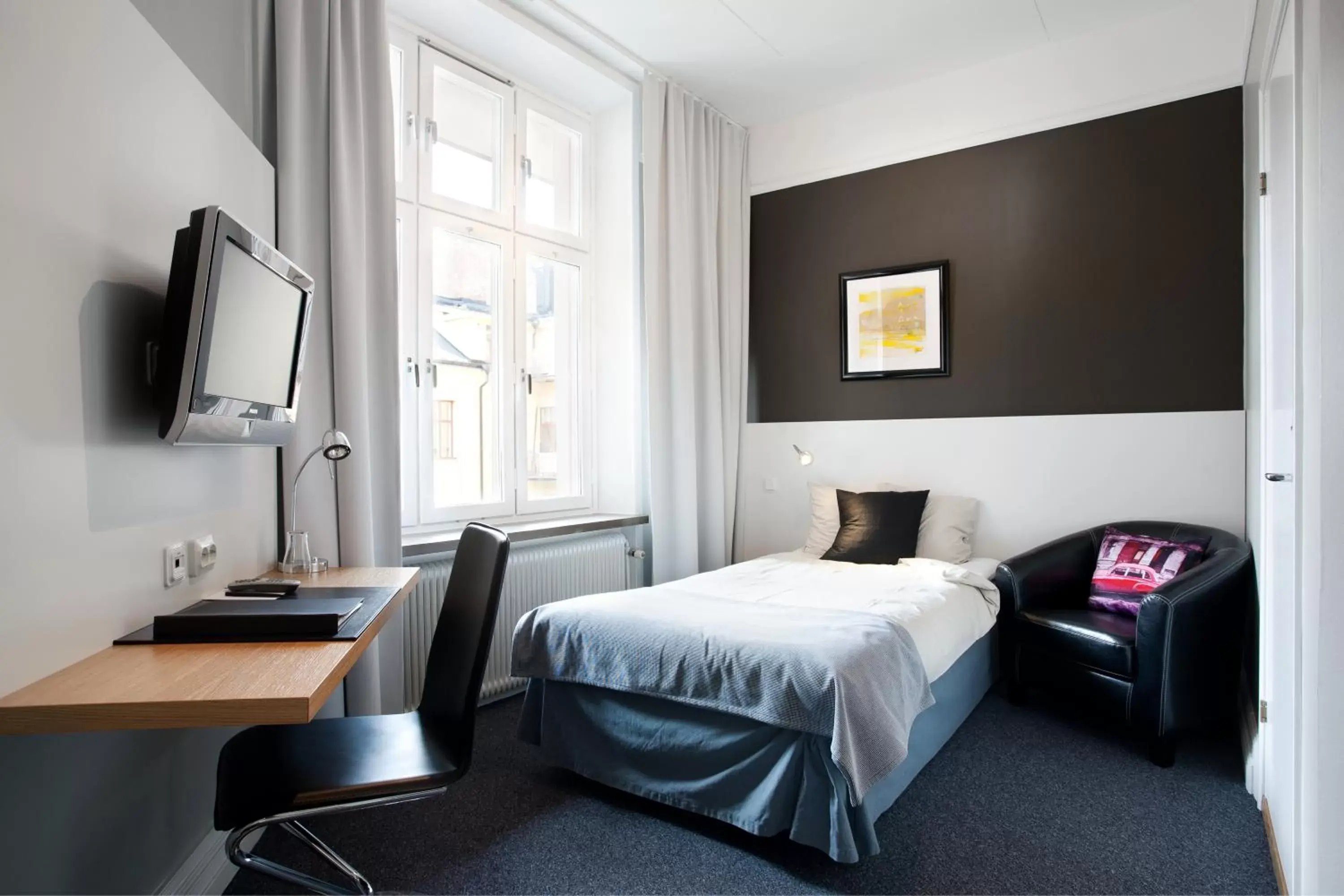 Photo of the whole room, Bed in First Hotel Örebro