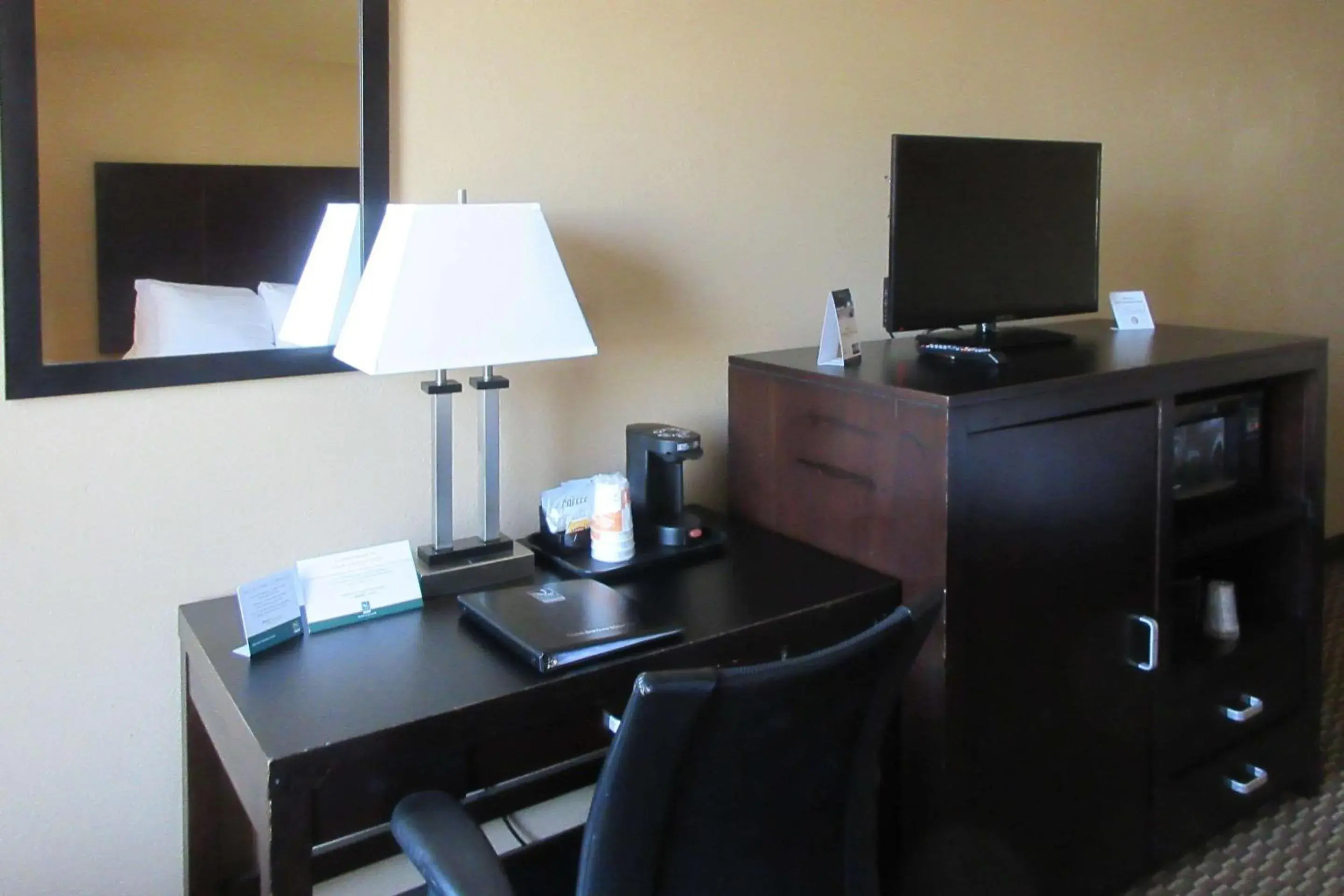 Photo of the whole room, TV/Entertainment Center in Quality Inn & Suites