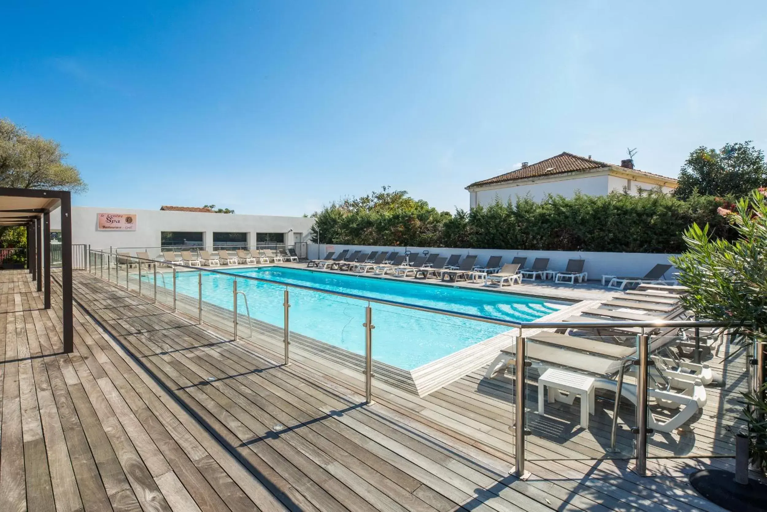 Swimming Pool in Hôtel Spa Restaurant La Madrague