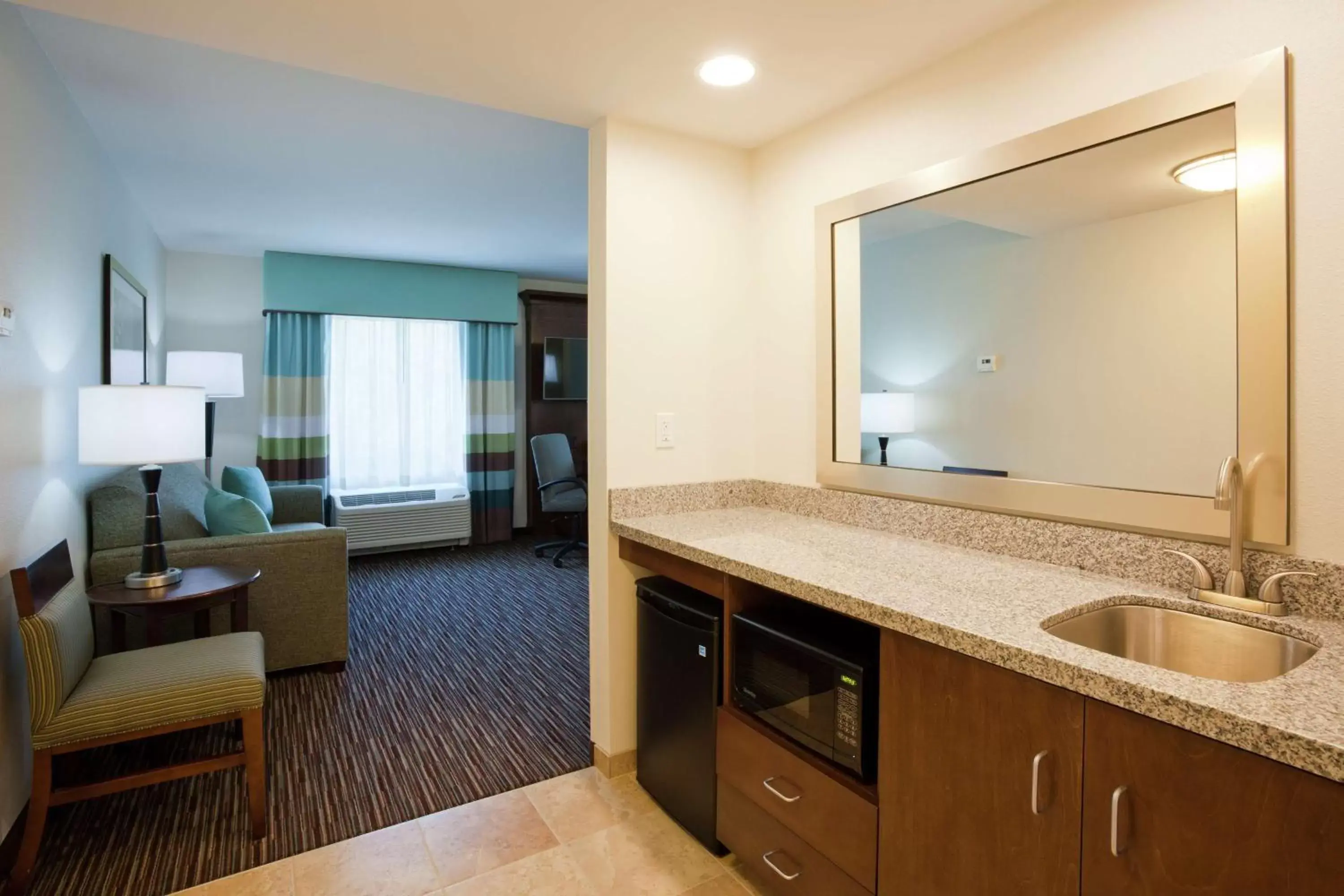 Living room, Bathroom in Hampton Inn & Suites Minneapolis West/ Minnetonka