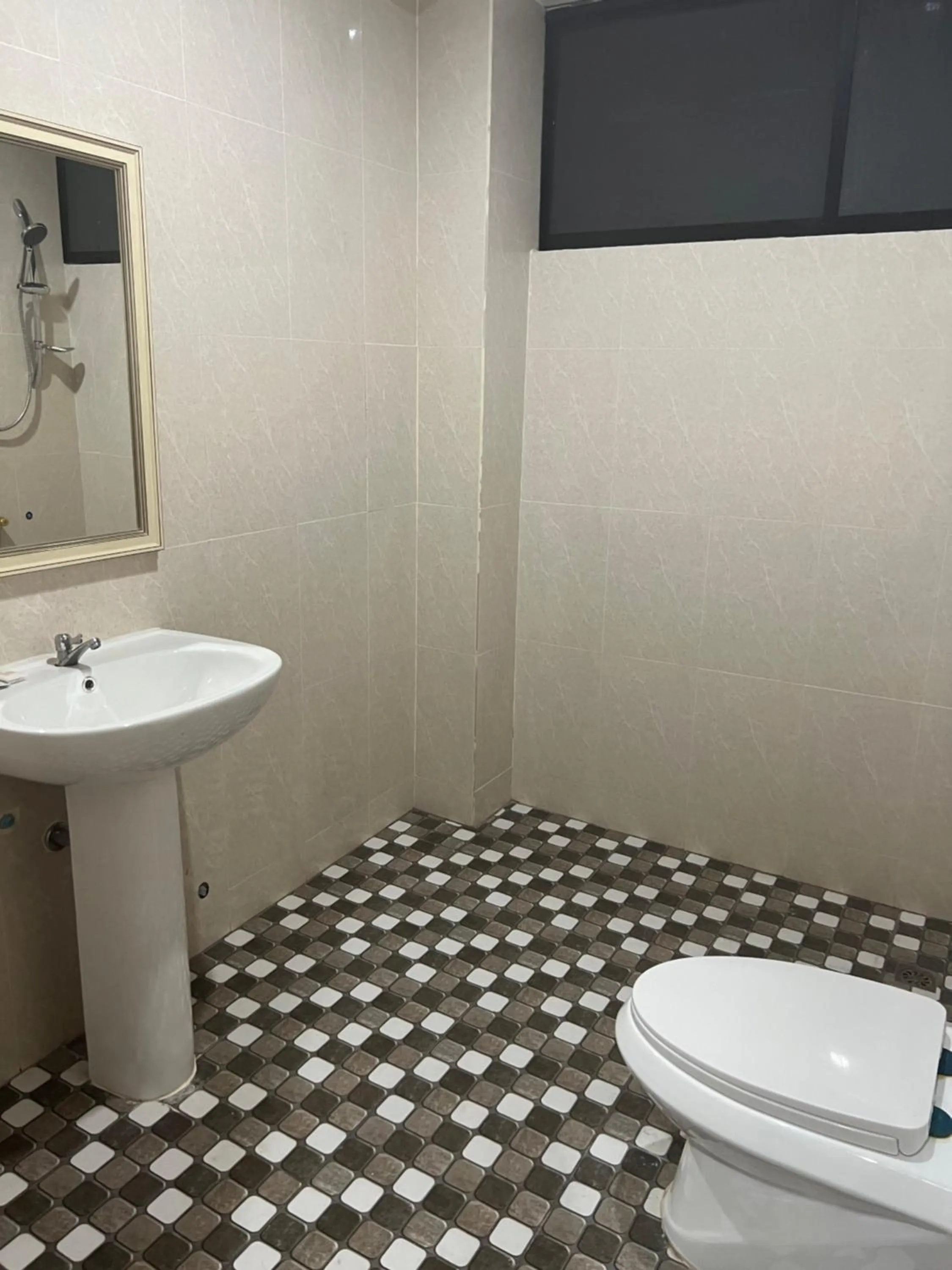 Bathroom in Mall Suites Hotel