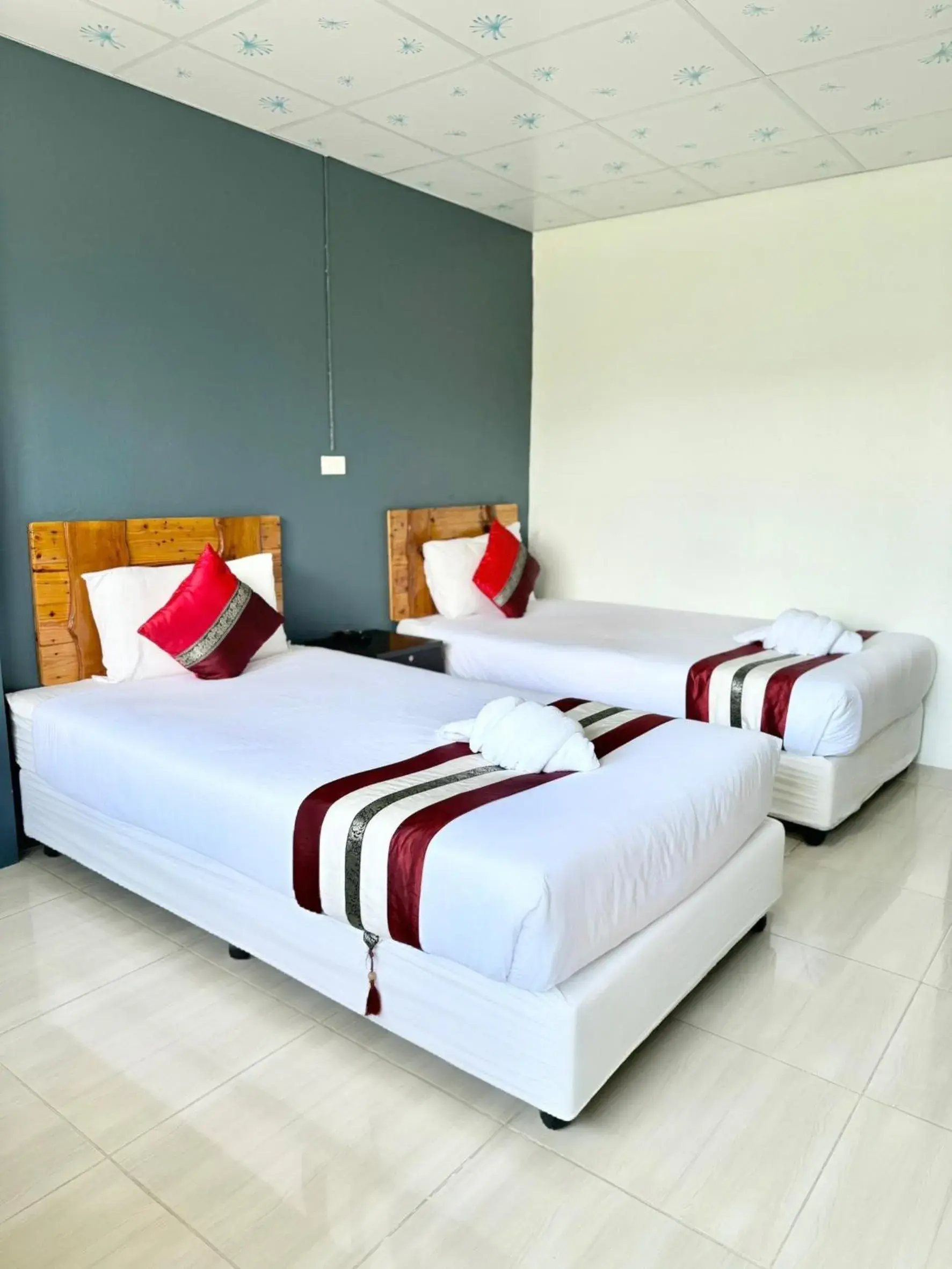 Bed in Diamond De Pai City Hotel