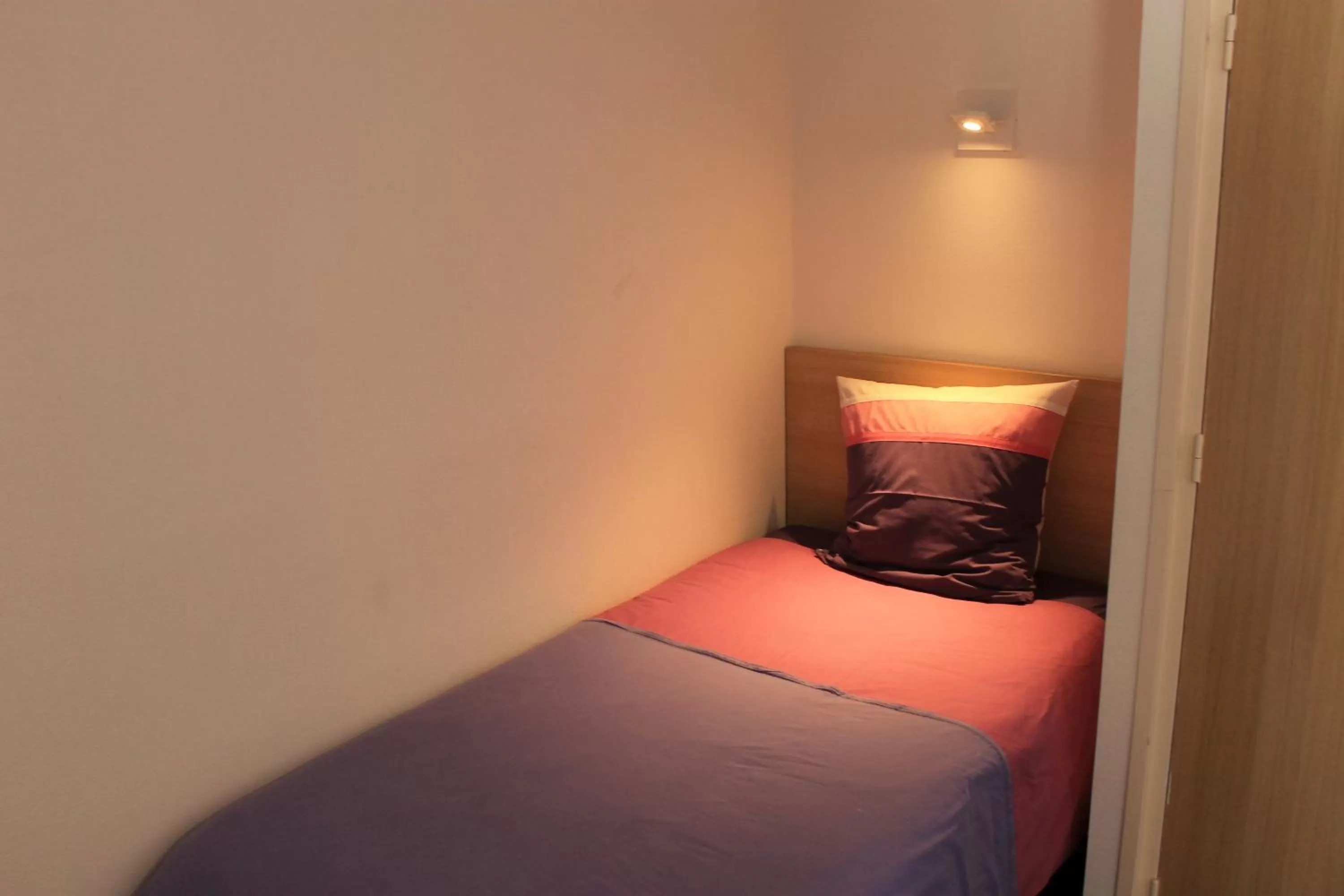 Bed in Hôtel du lion d'or