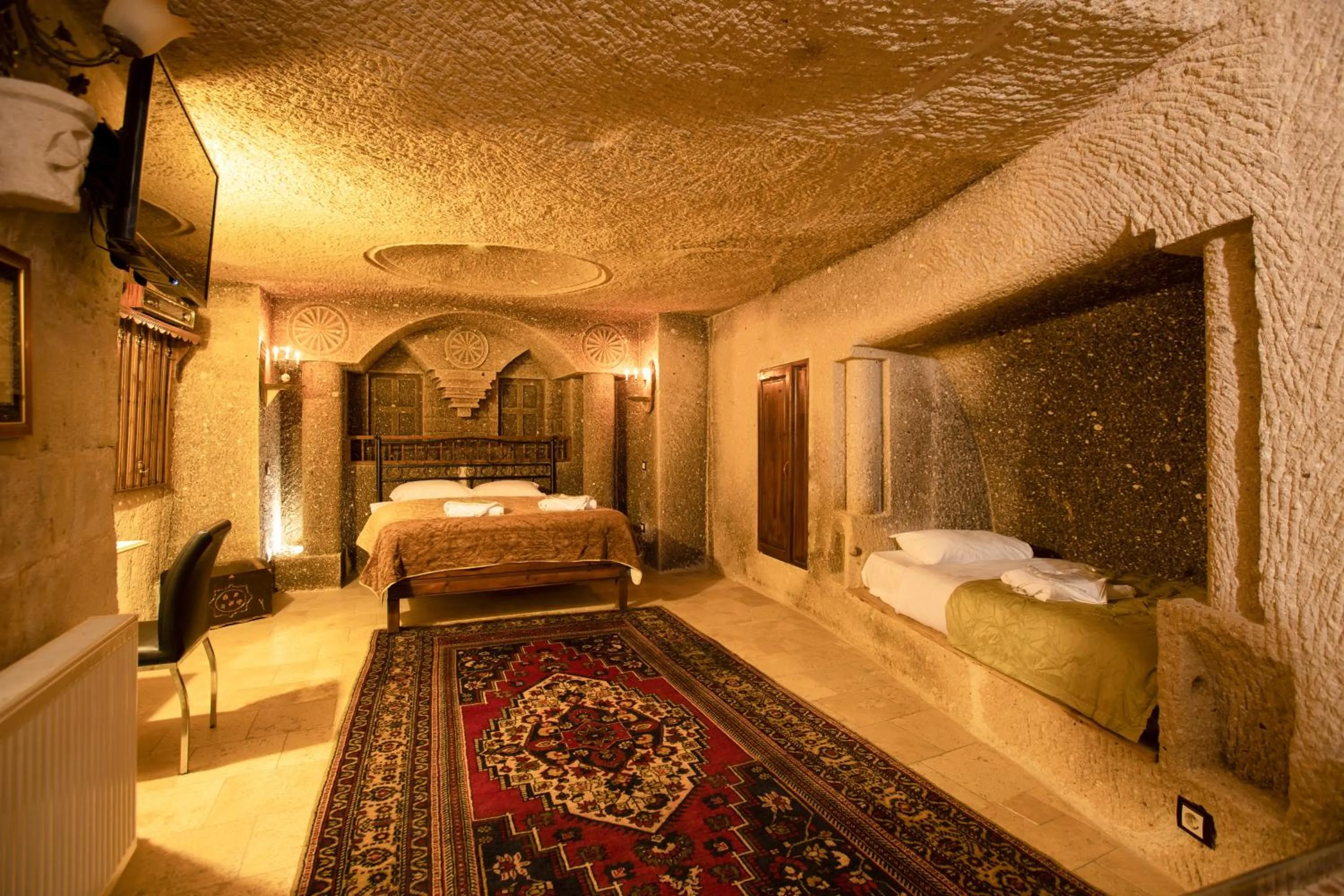 Property building, Bed in Antique Terrace Cave Suites