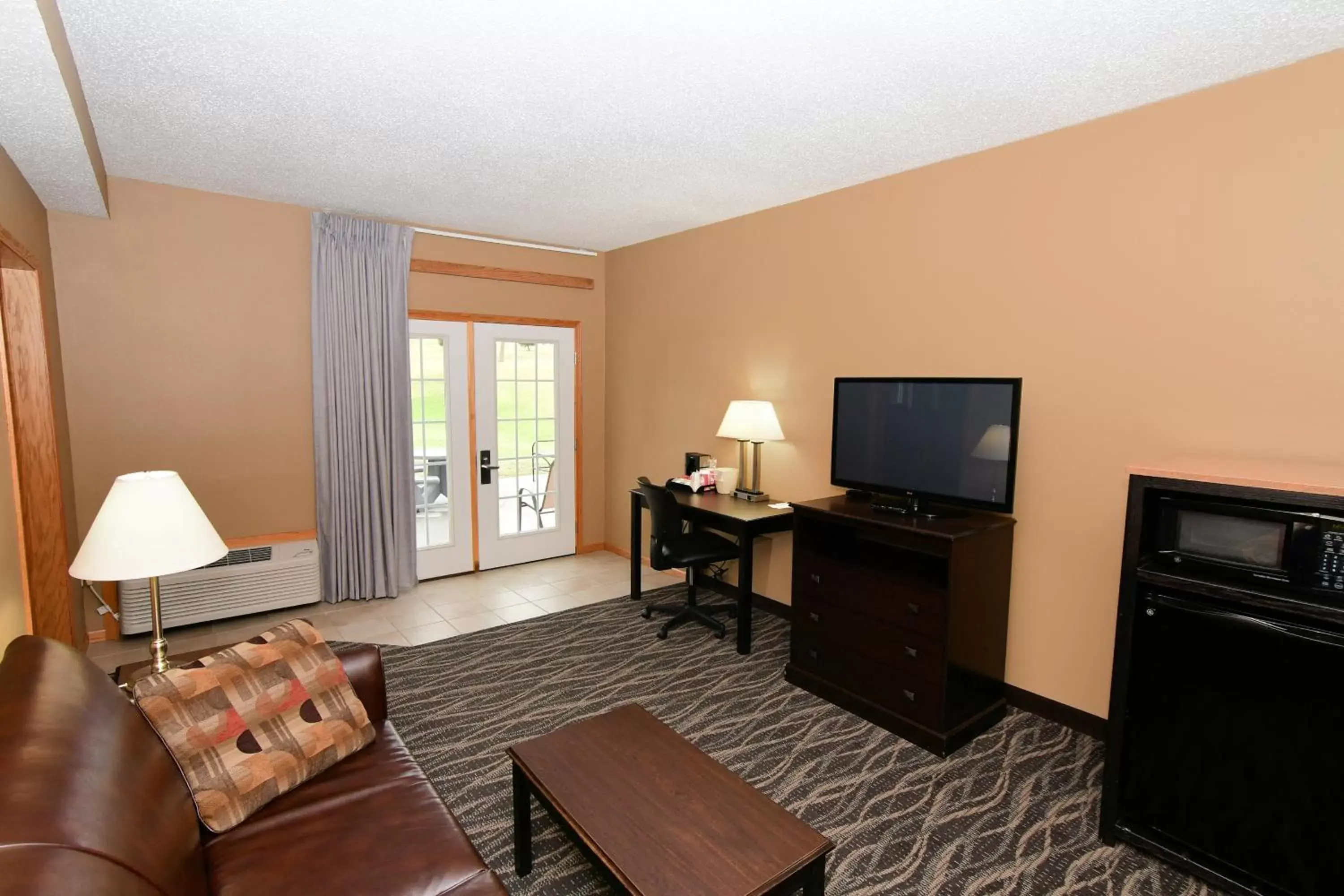 TV and multimedia, TV/Entertainment Center in Cobblestone Inn & Suites - Denison | Majestic Hills