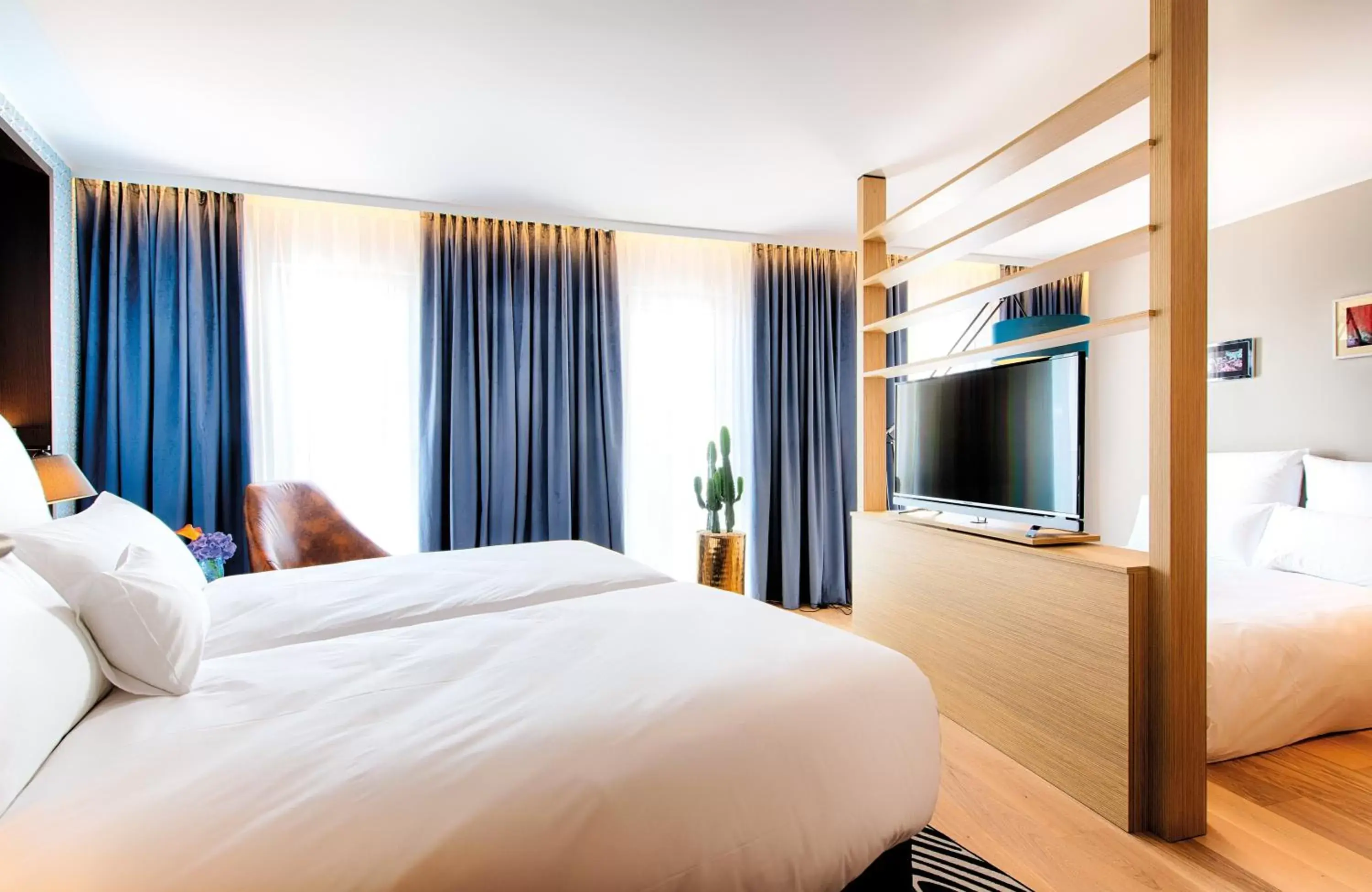 Photo of the whole room, Bed in NYX Hotel Munich by Leonardo Hotels