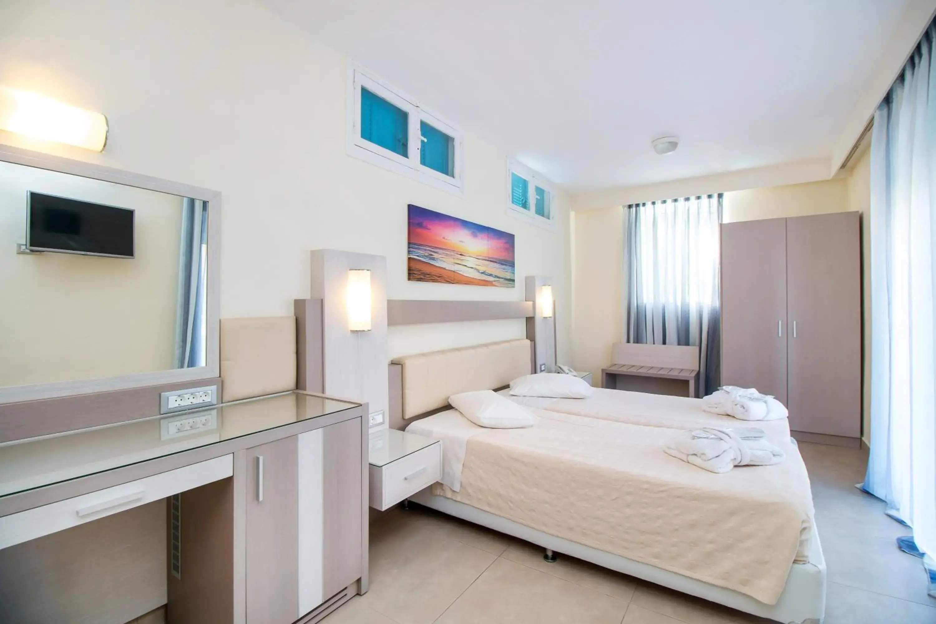 Bedroom in Pegasos Deluxe Beach Hotel