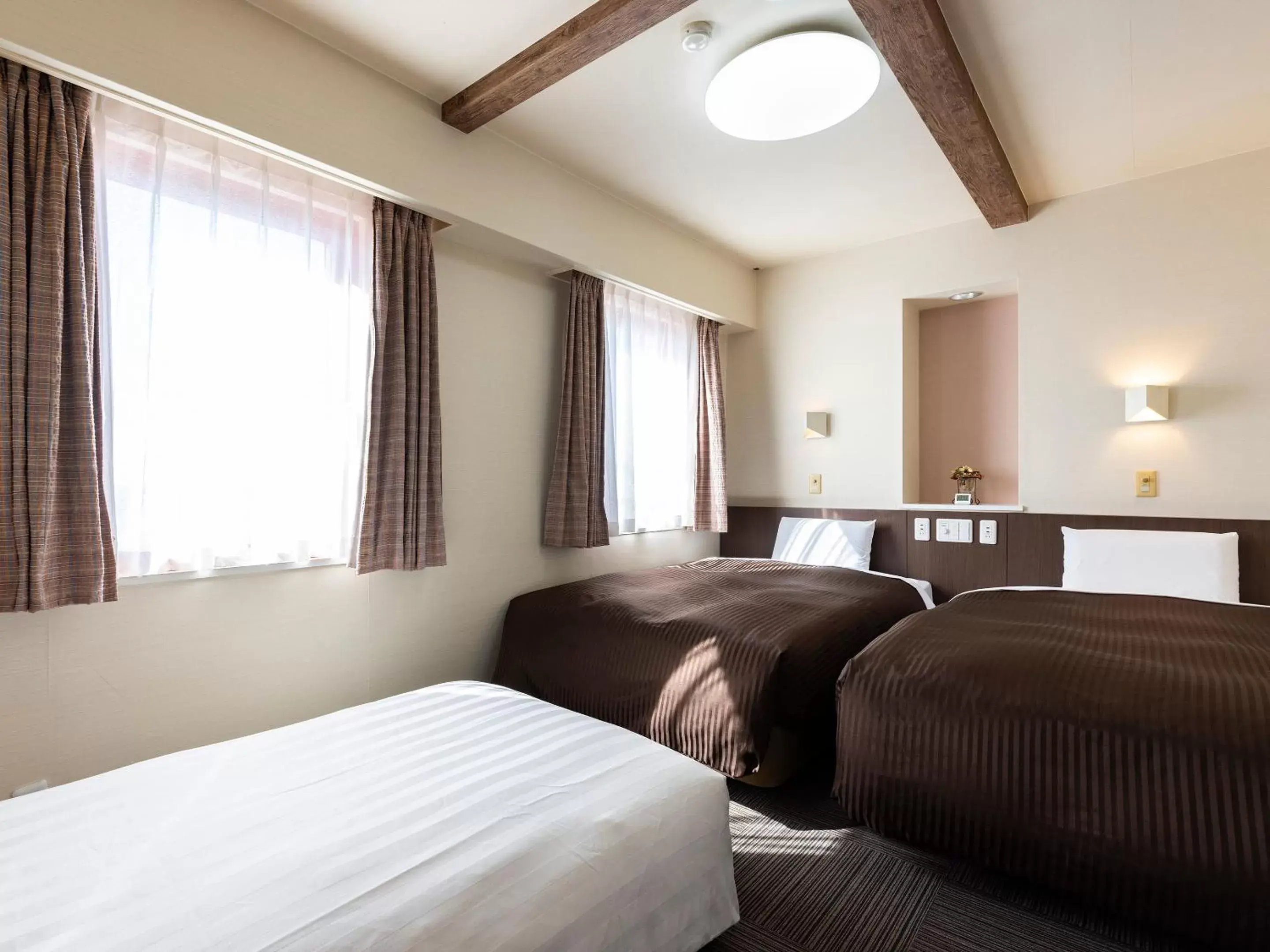 Photo of the whole room, Bed in Hotel Wing International Izumi