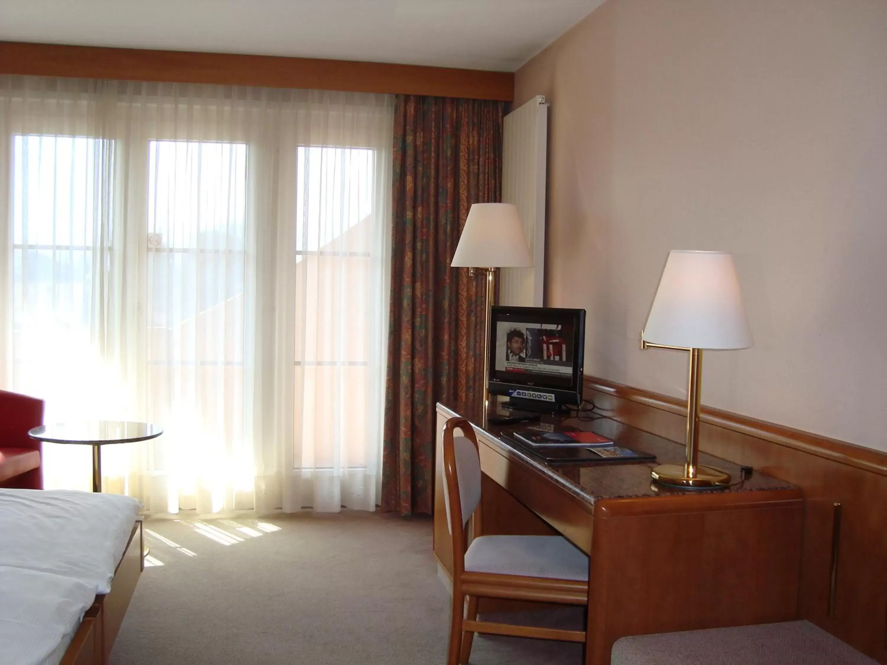 Photo of the whole room, TV/Entertainment Center in Hotel Le Cedre
