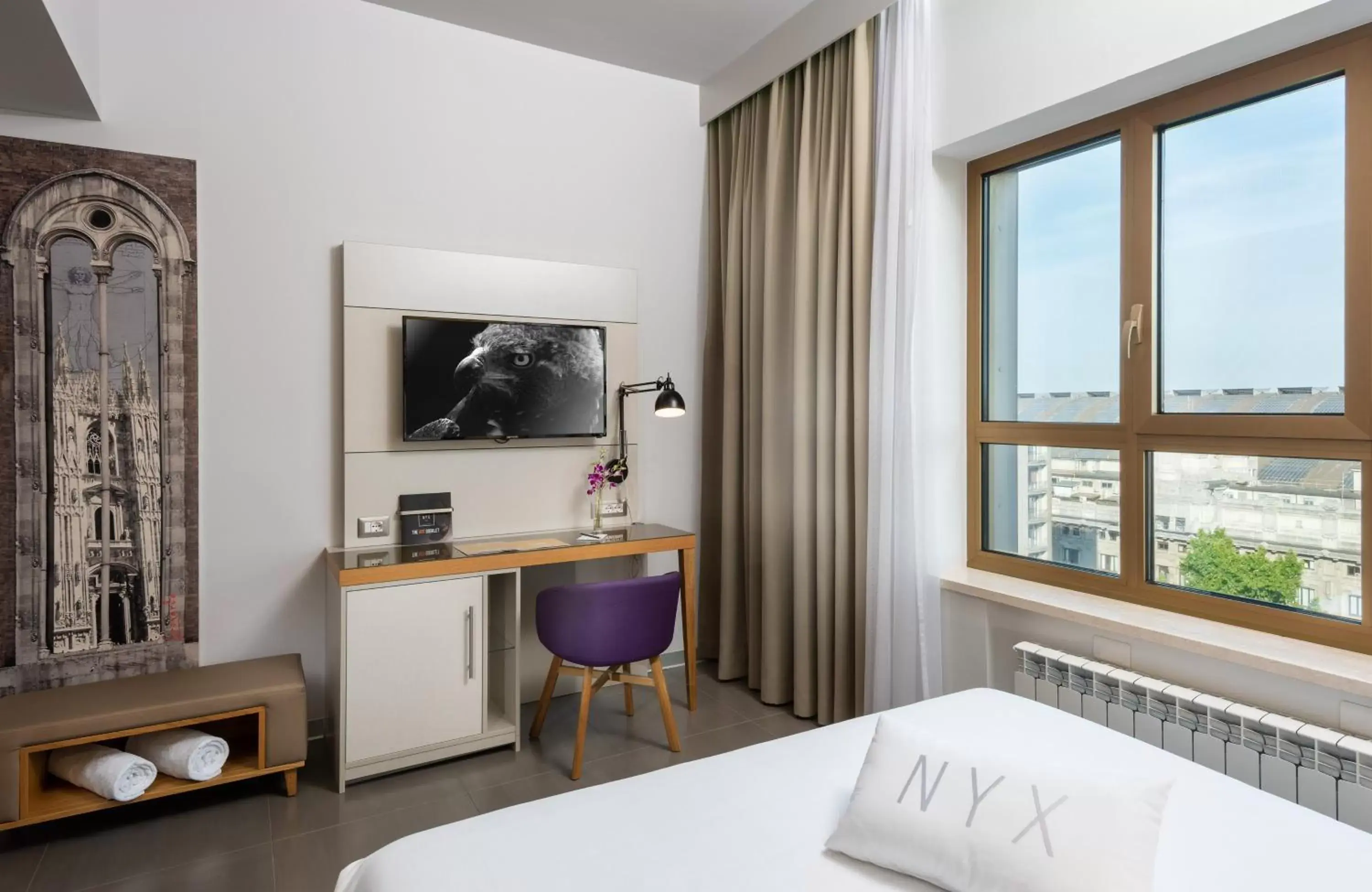 Bedroom, TV/Entertainment Center in NYX Hotel Milan by Leonardo Hotels