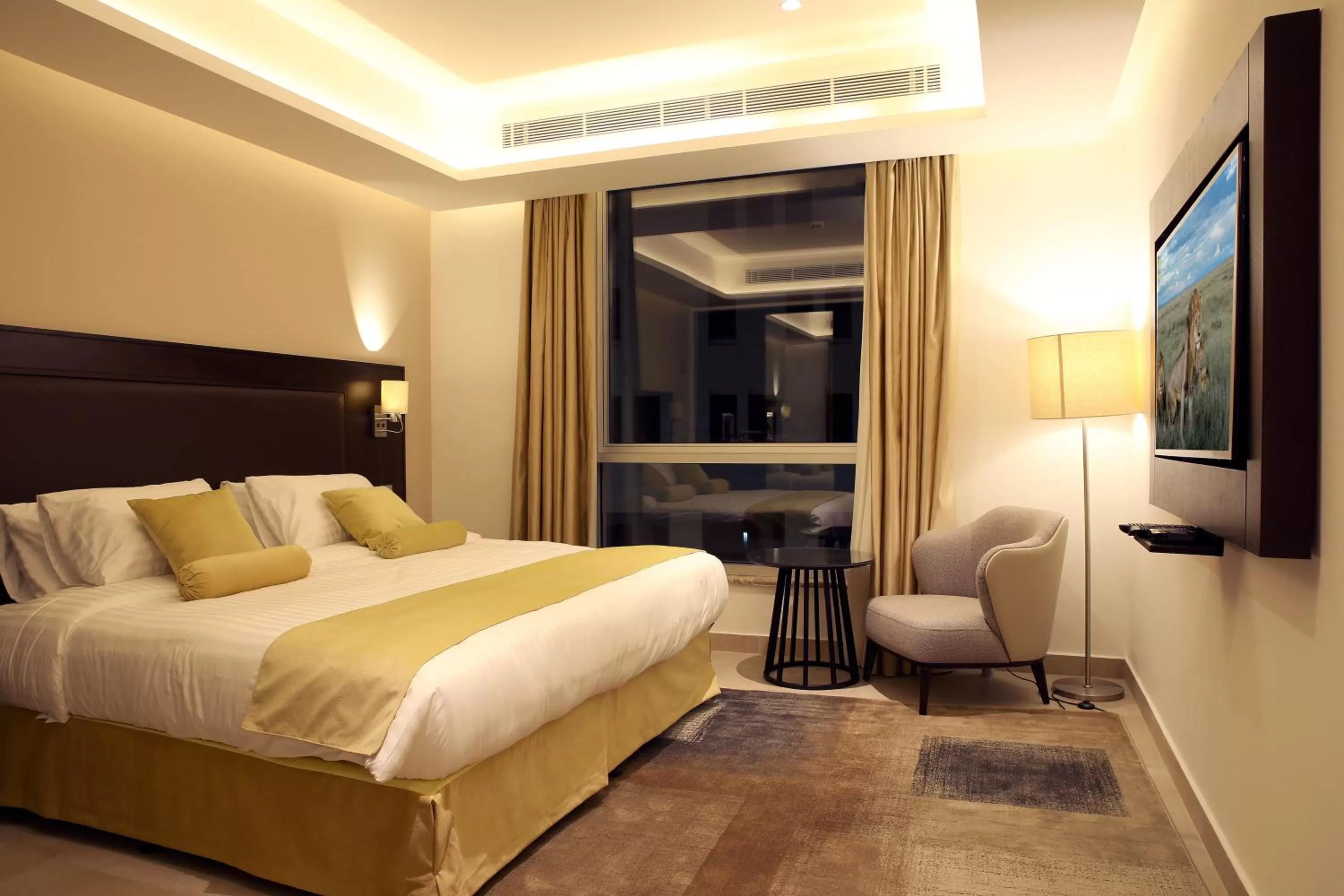 Bed in Downtown Hotel Apartments