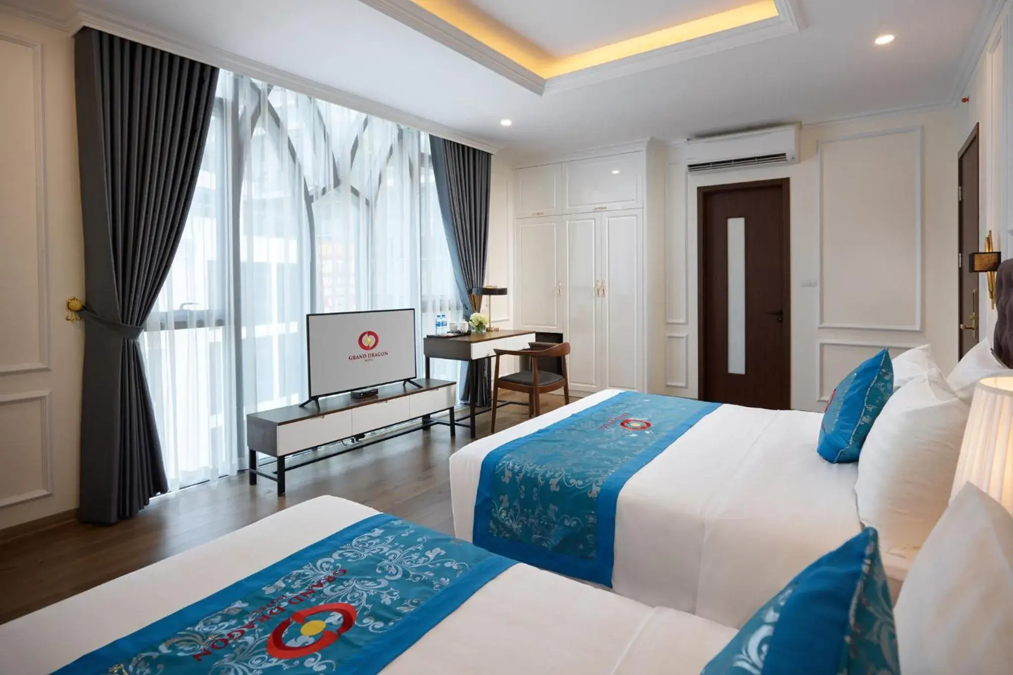 Bed in Grand Dragon Hotel Hanoi