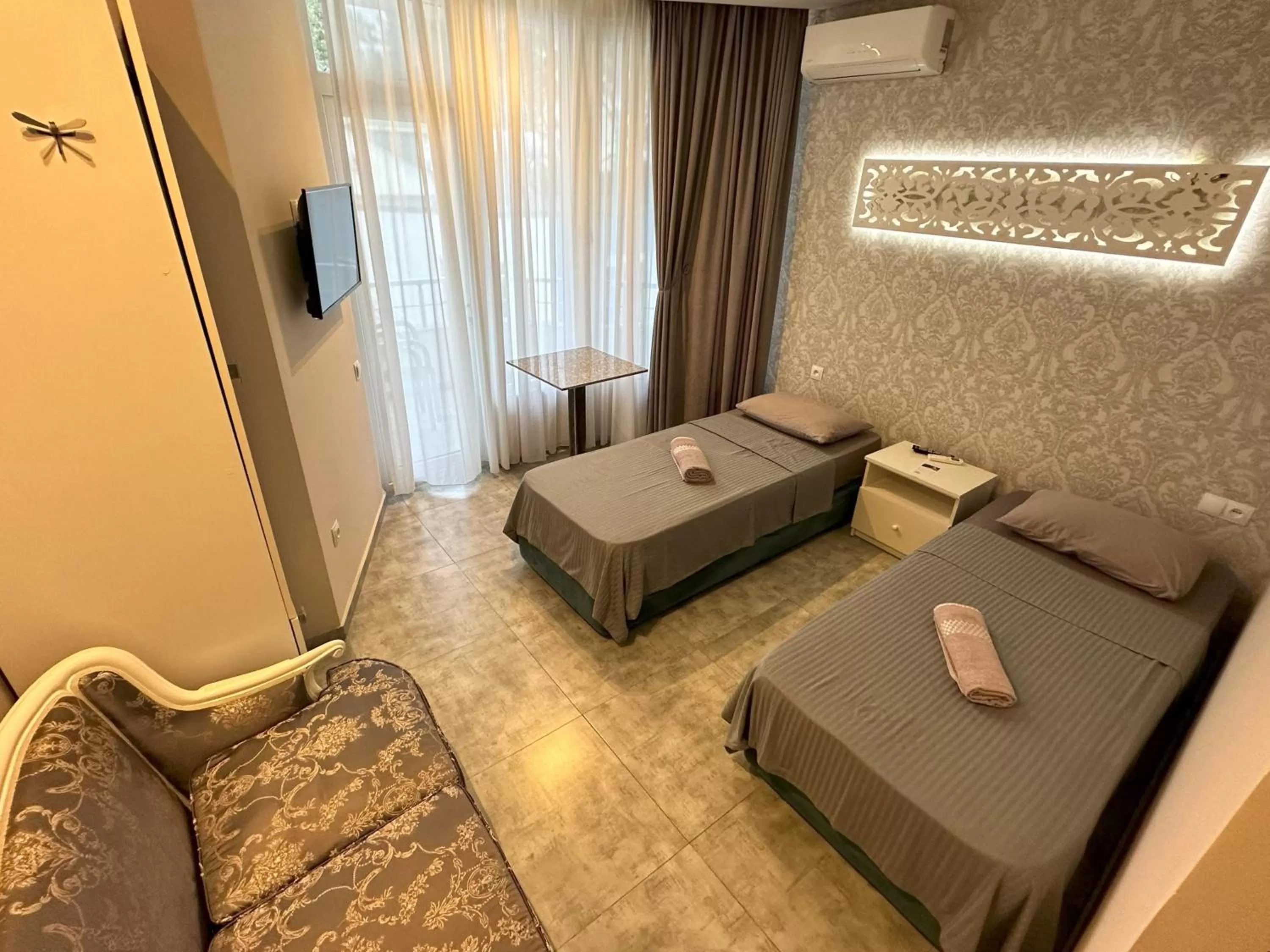 Photo of the whole room, Bed in National+