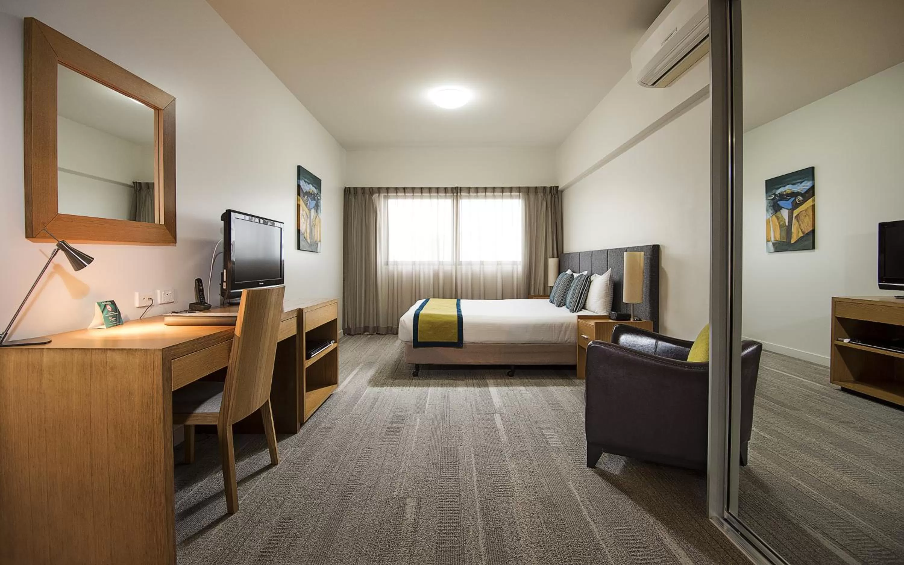 Living room, Bed in Aligned Corporate Residences Mackay