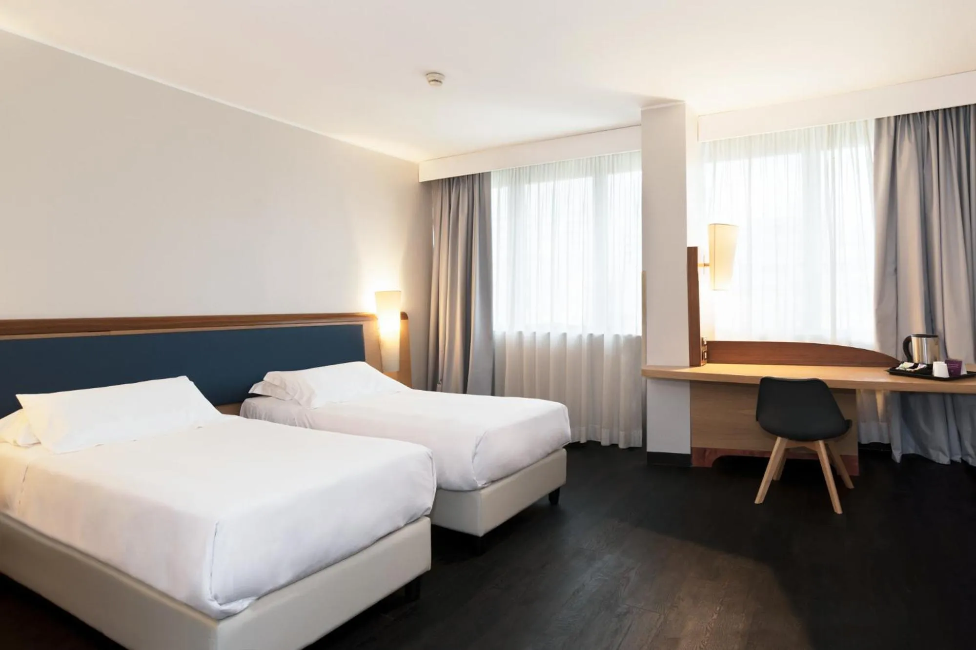 Bed in Mercure Roma West