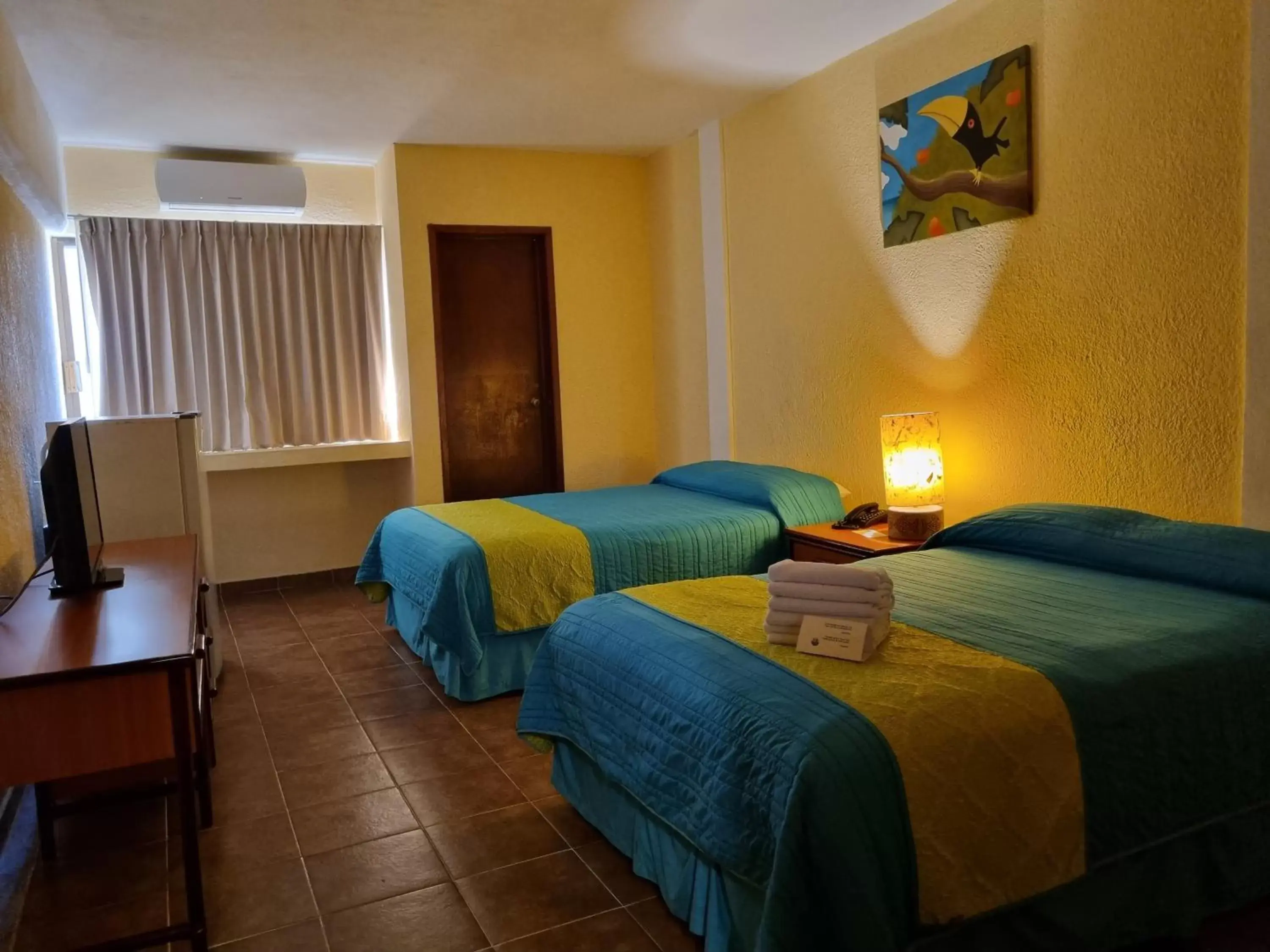 Bedroom, Bed in Hotel Plaza Cozumel