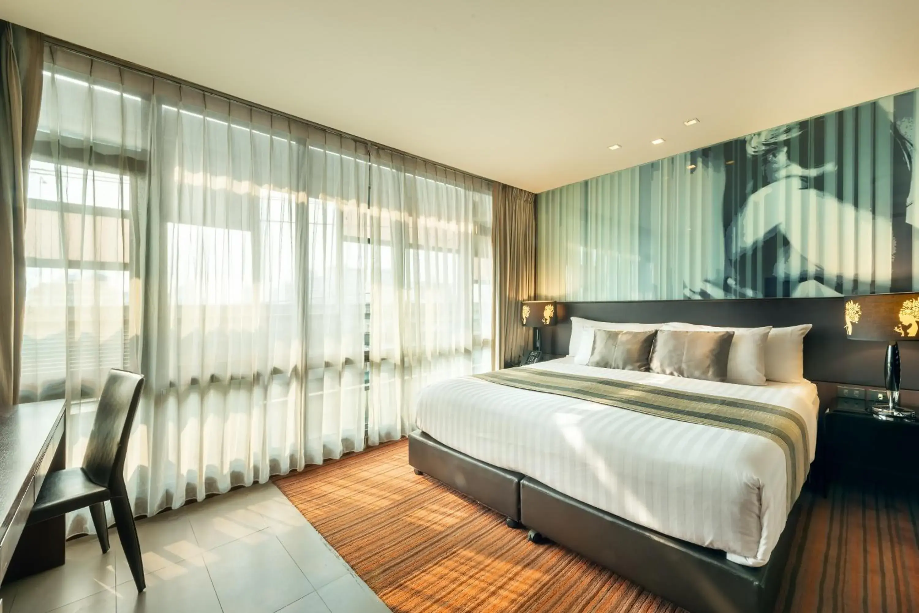 Bed in M2 de Bangkok Hotel (SHA Plus)