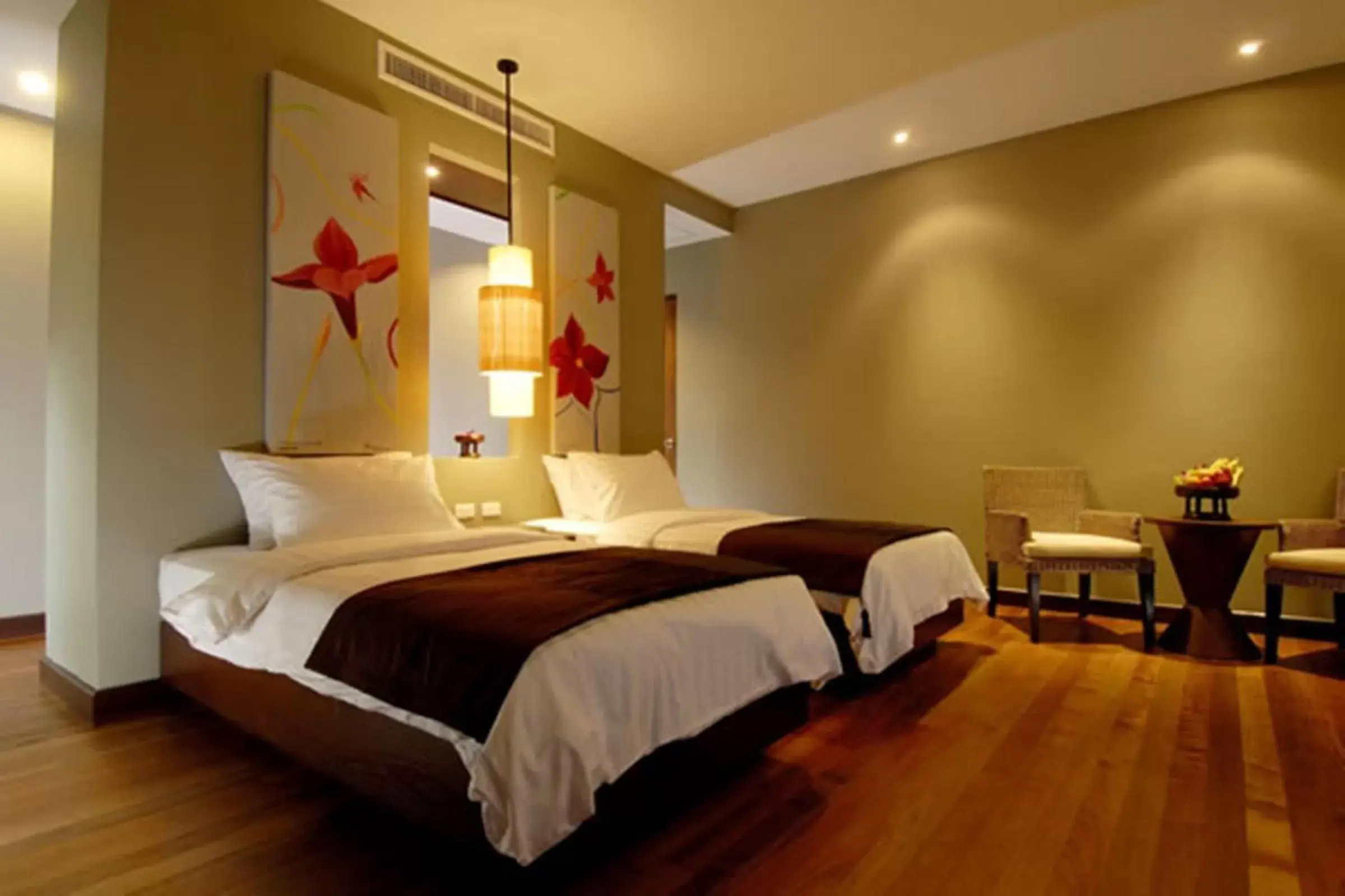 Bed in Chongfah Beach Resort Khaolak - SHA Extra Plus